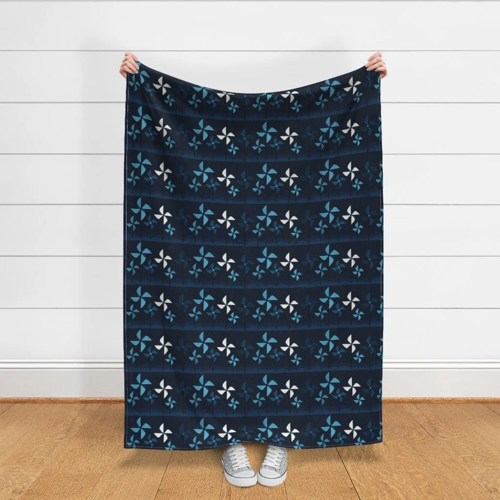Midnight Pinwheel Parade Border Throw Blanket.jpeg