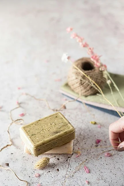 2 bas of homemade soap with twine and flowers