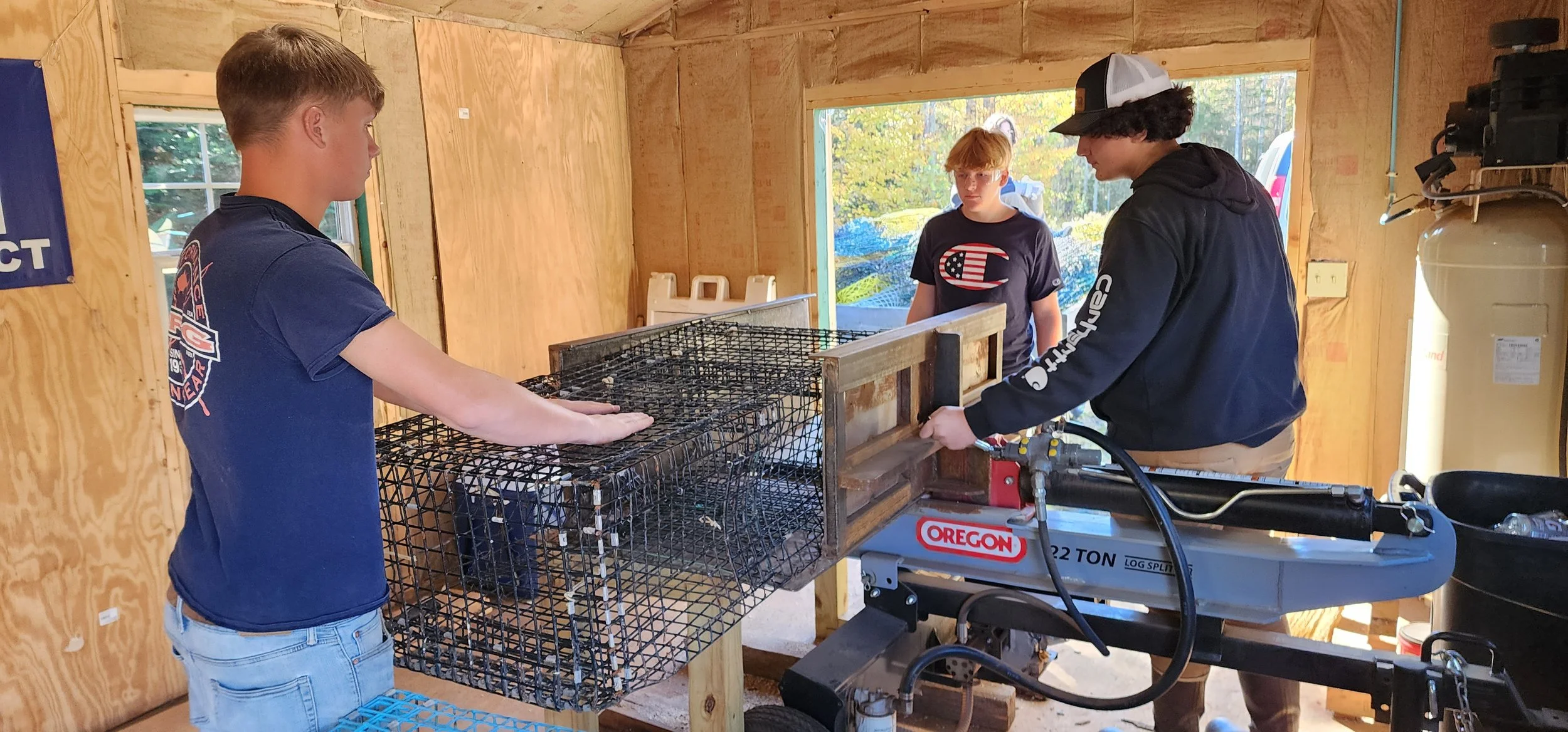 OW working on trap crushing for material recycling.