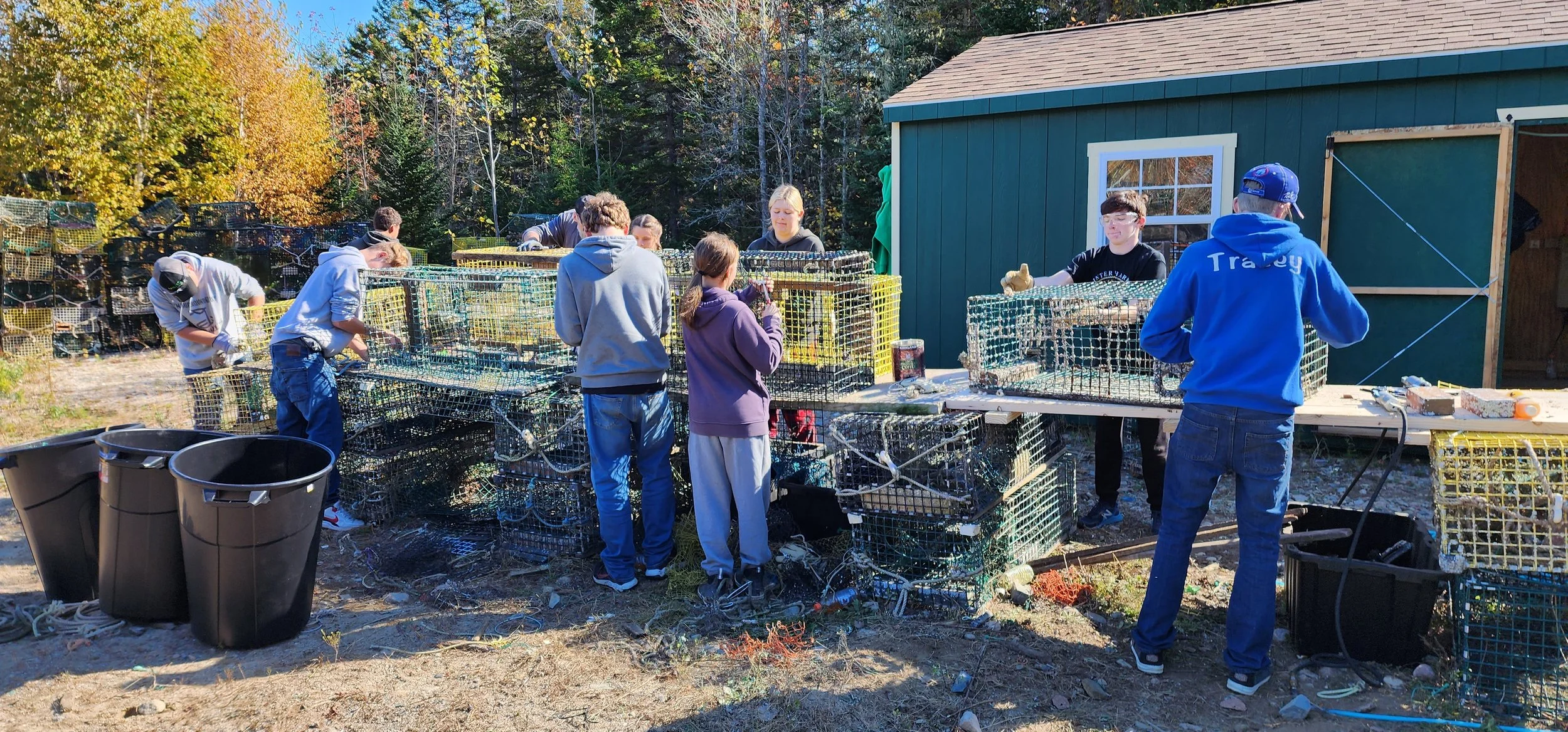 OW working on trap crushing for material recycling.