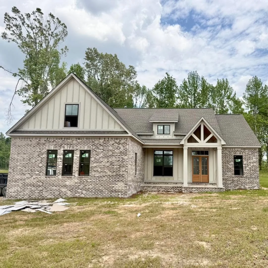 Progress is moving right along in Double Gate Subdivision! 🚧✨

Lot 14 is coming together beautifully with tile work completed, gutters installed, and tongue &amp; groove details starting to take shape on the porch ceilings. We&rsquo;ve also begun di