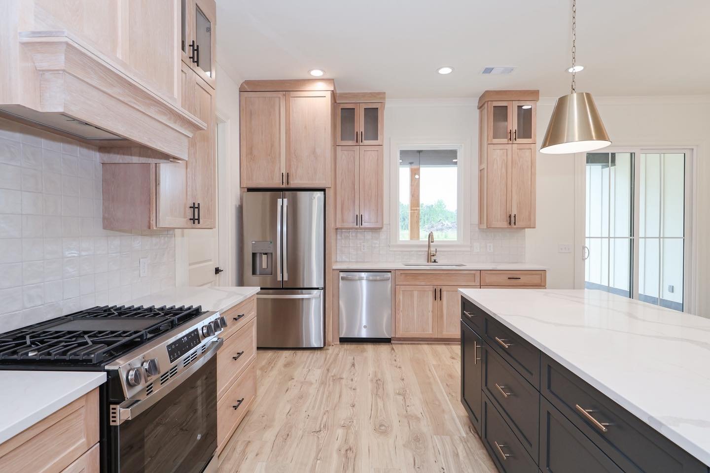 This kitchen was designed to make a statement ✨

Natural wood cabinetry, a bold contrasting island, and warm finishes come together to create a space that feels both modern and timeless.

What detail is your favorite? Let us know in the comments belo
