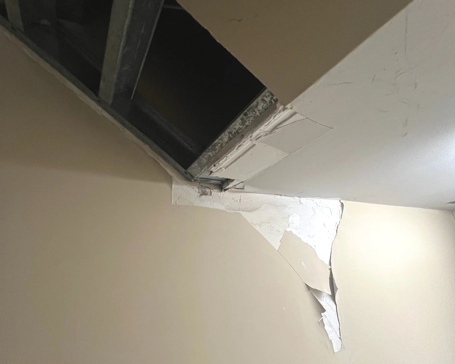 Cracked and peeling drywall