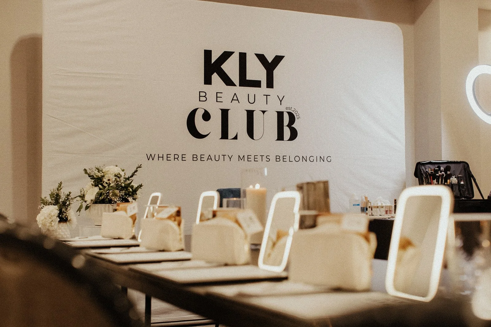 Black gloved hand with 'You need a facial' written on the fingers.