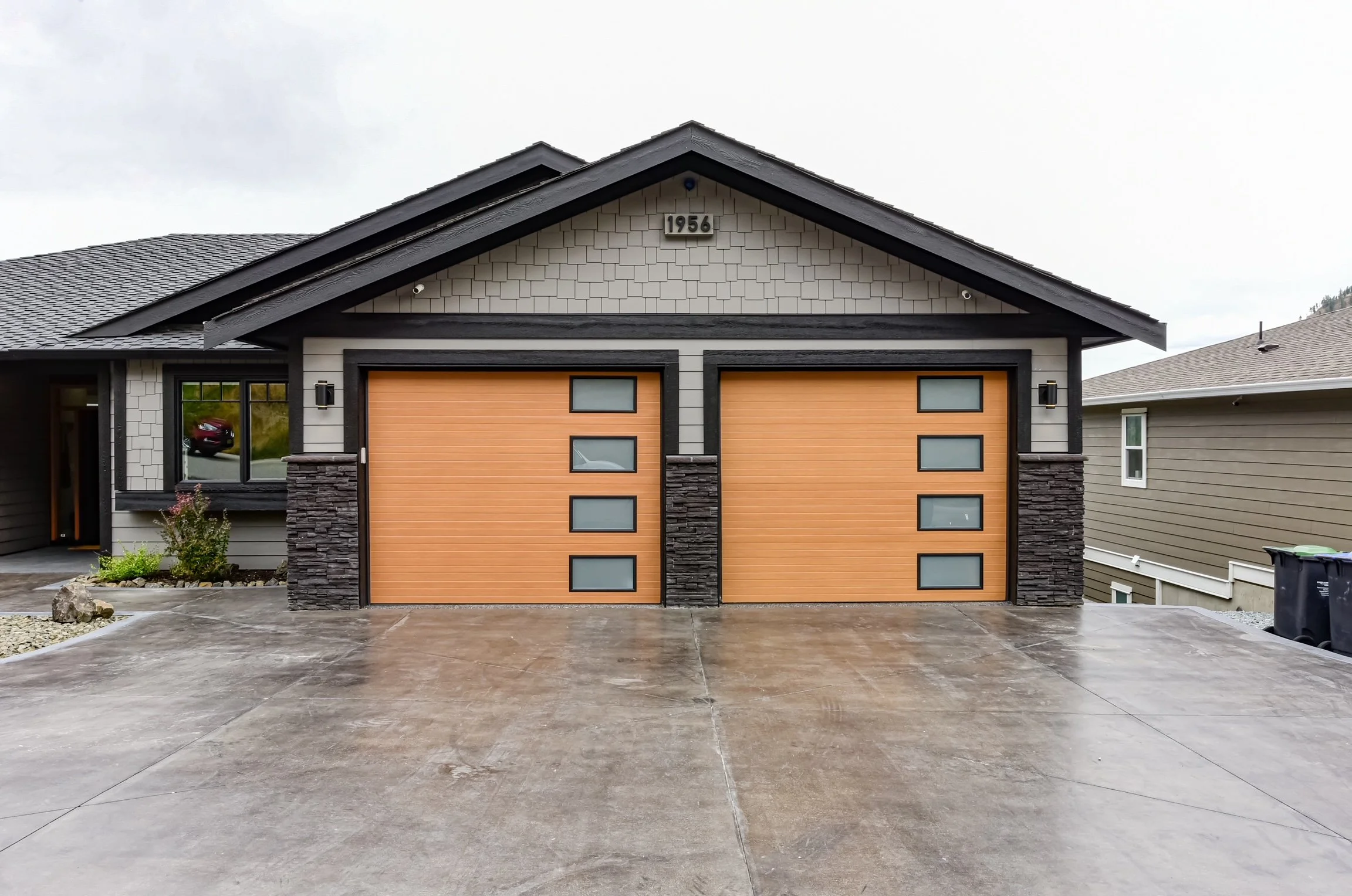 Exterior. Custom Home Build on Upper Sundance Drive in West Kelowna, BC by Pure Build Construction.