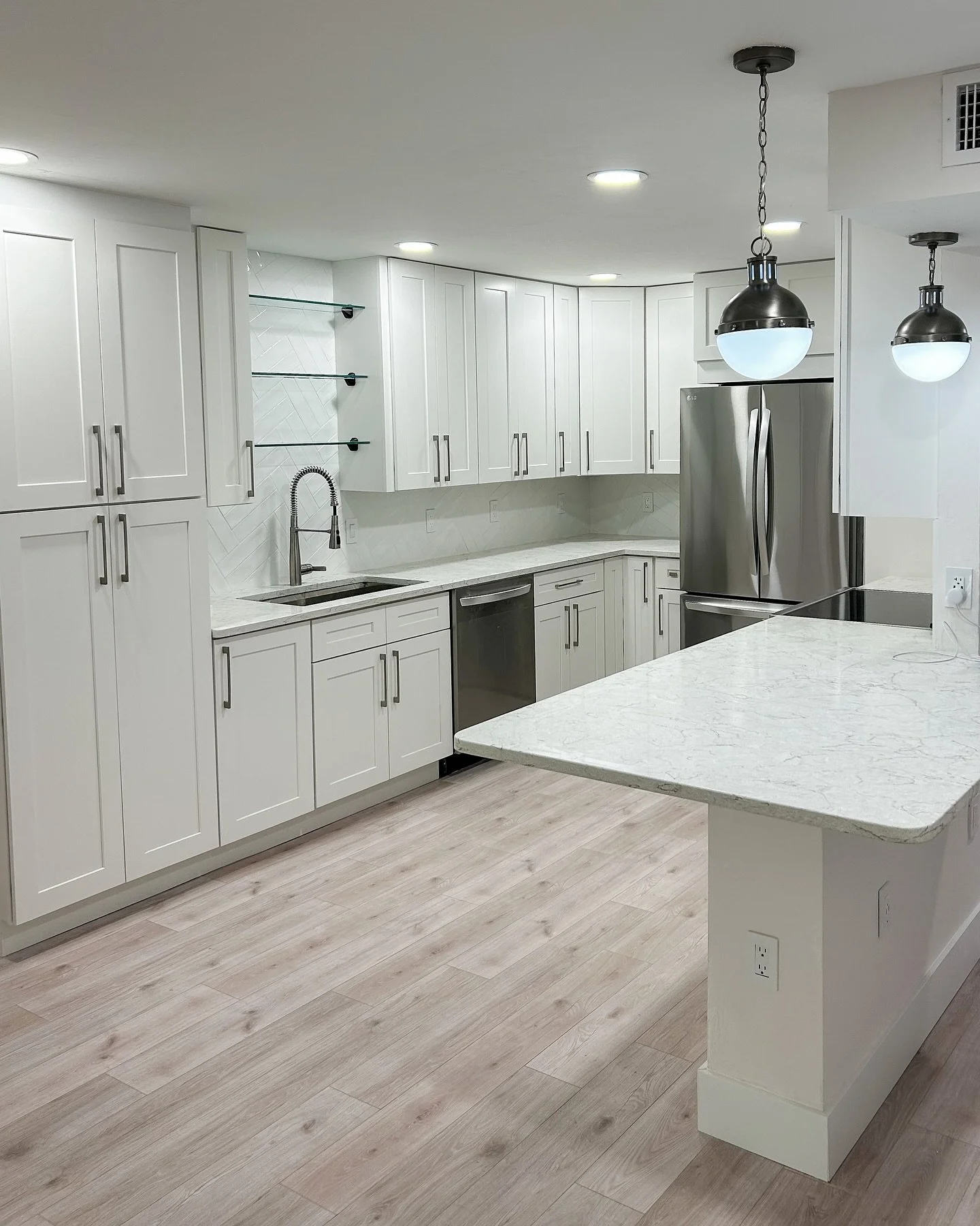 Clean, bright, and timeless! Our most recent kitchen remodel is all about fresh starts and modern details. Swipe to see the &ldquo;before&rdquo; and how much light was brought to this space! Ready to cook up something beautiful in your home? Let&rsqu