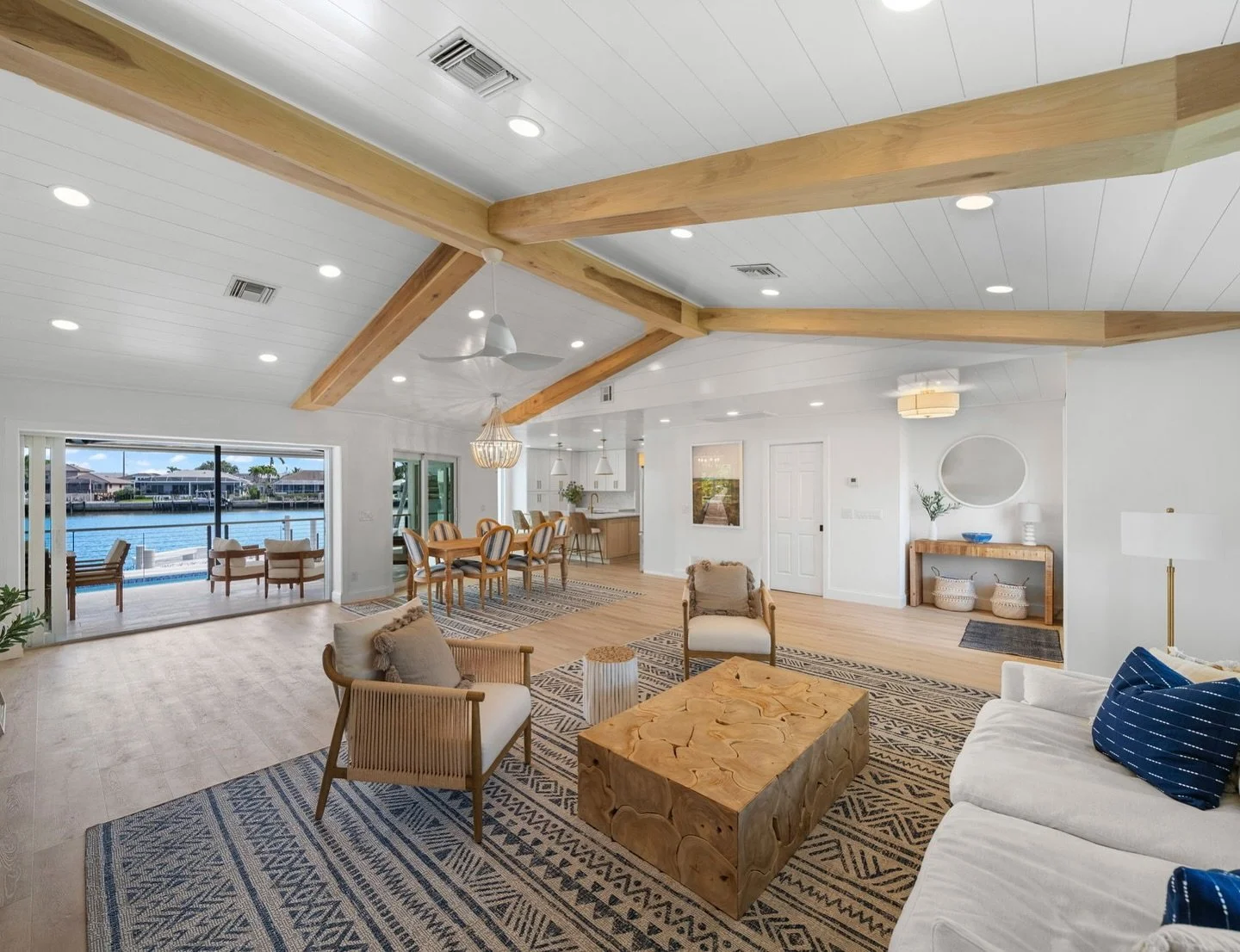 Wrapping up the final touches on this whole-home remodel&mdash;what a difference! 🌊☀️ We expanded the living space, installed all-new flooring, and added shiplap &amp; ceiling beams, custom-stained to match the space. We were able to bring our clien