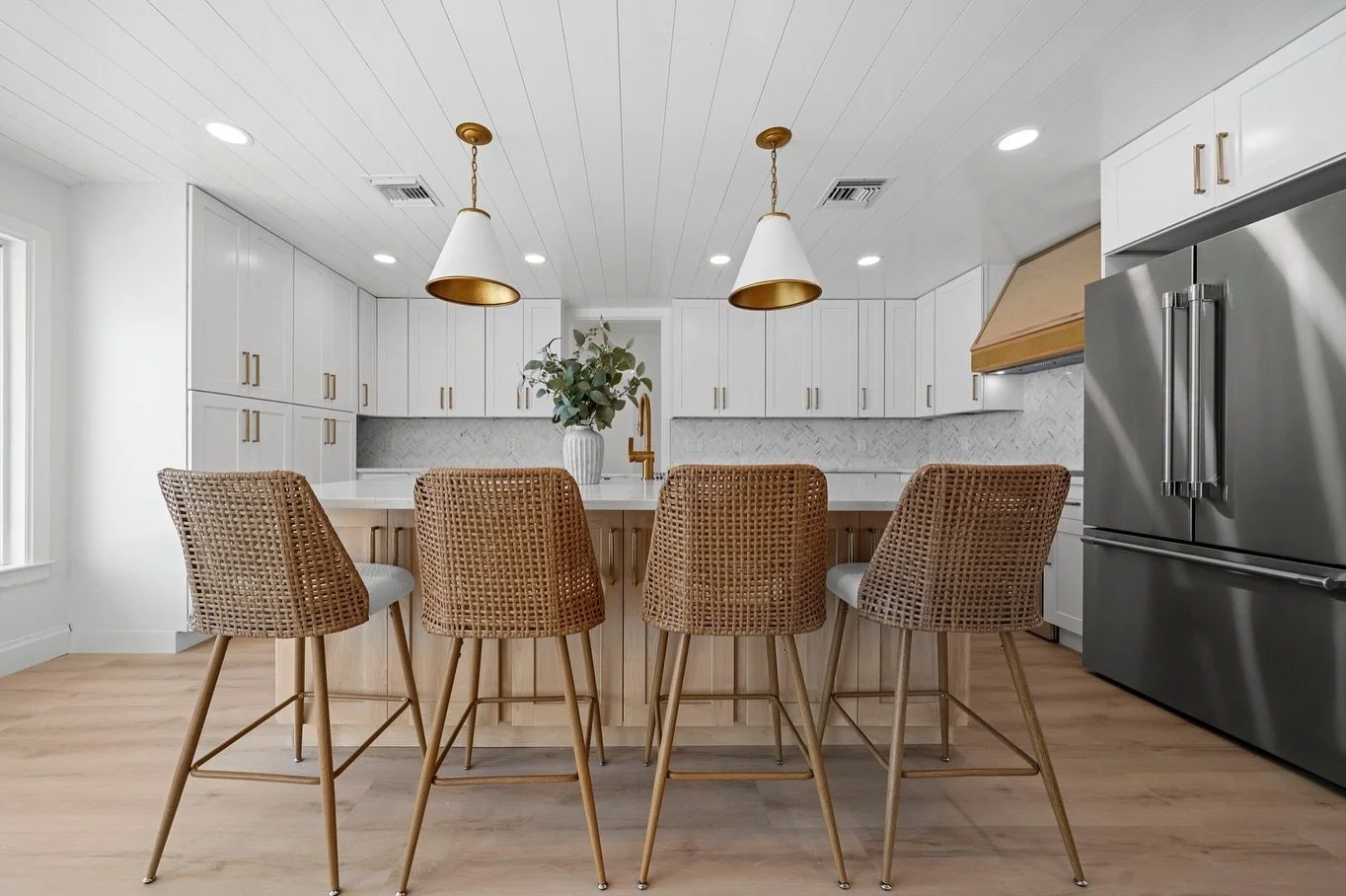 From cramped and outdated to spacious and stunning! This kitchen remodel was a full transformation&mdash;we relocated the entire space to make room for an oversized island, a built-in wine fridge 🍷, and endless storage. Who else is dreaming of cooki