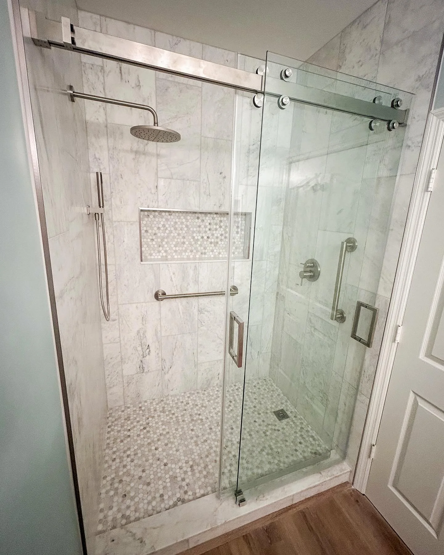 We transformed two bathrooms for this client&mdash;from demolition to completion&mdash;in under two weeks, including a custom frameless glass enclosure. Ready to upgrade your space? Let&rsquo;s make it happen! 🛠️ 

#BathroomRemodel 
#BeforeAndAfter
