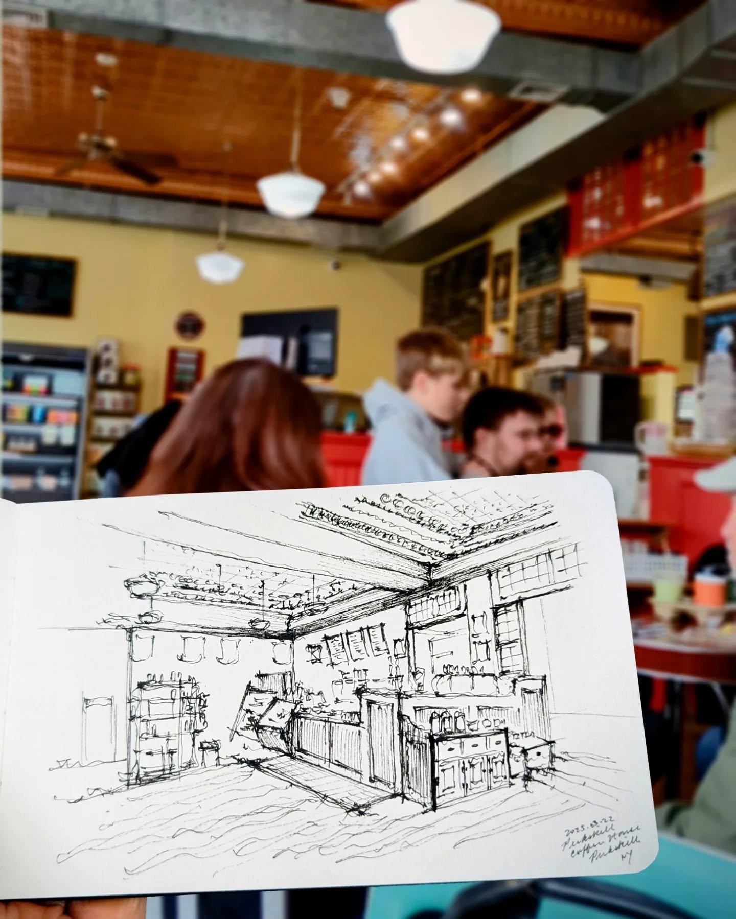 Sometimes you walk in for coffee and end up staying for the shapes and shadows in the ceiling. Another artist is fully immersed in his work, and a kid stops to say my sketch looks cool. 
@peekskillcoffee

#quicksketch #drawnthere #sketchbookpage #pen