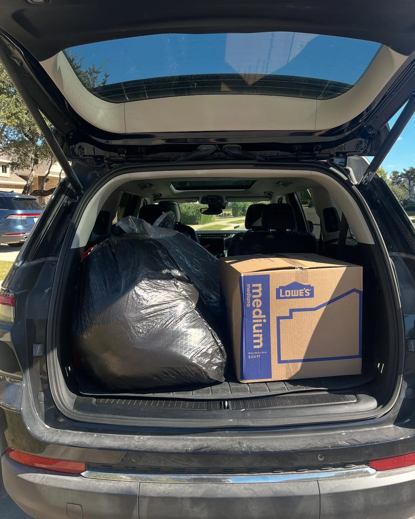 ✨ The best time to declutter and purge is before a move! ✨⁣
⁣
Today&rsquo;s client is getting a head start! Everything in the back of my car is headed for donation. We went closet by closet, deciding what stays and what goes so only the right things 