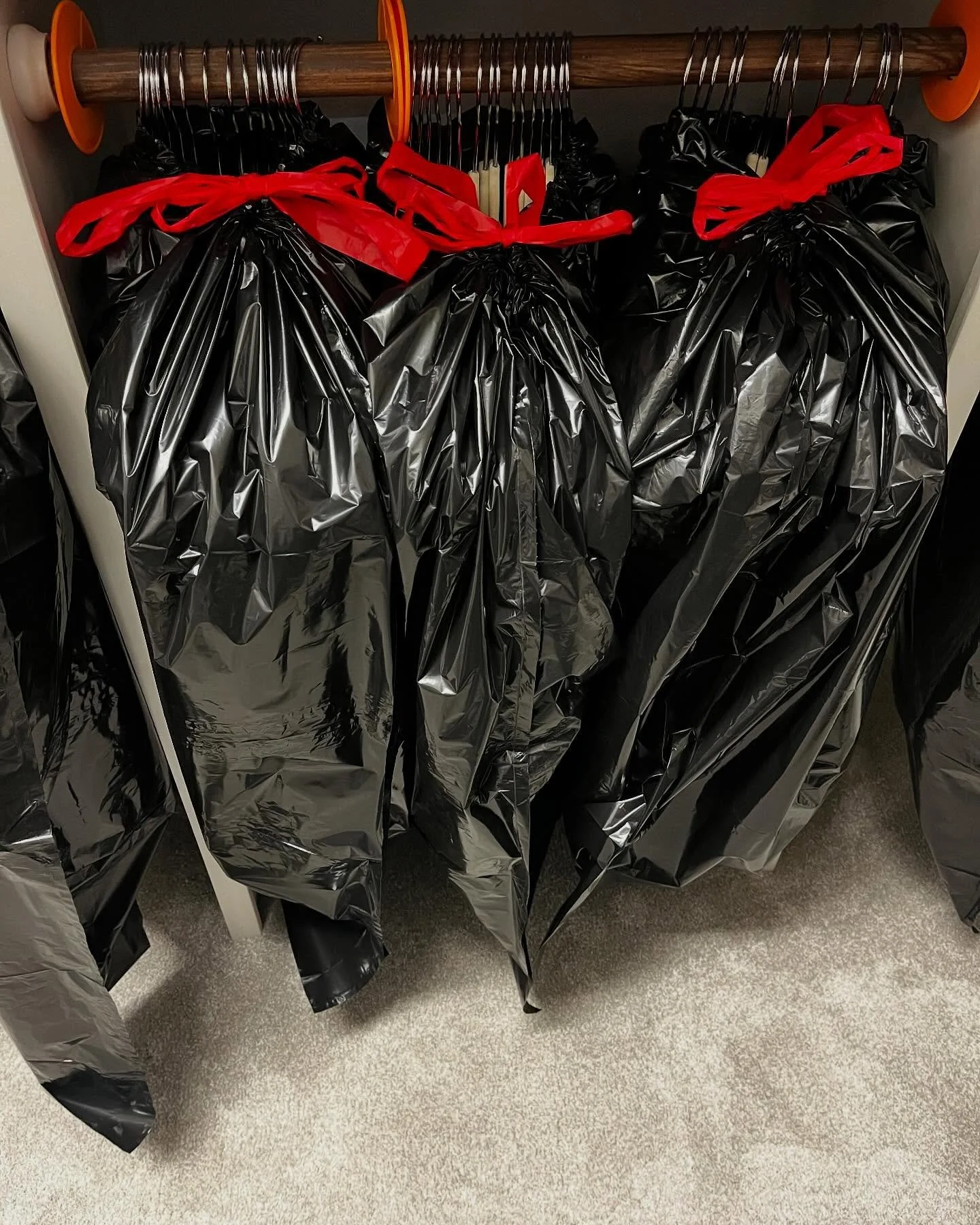 ⁣
Today we packed!⁣
⁣
Wardrobe boxes are great, but this method works just as well for short moves. 

Keep clothes on hangers, group about 10&ndash;15 items together, pull a heavy-duty trash bag up from the bottom, and tie tightly at the top.⁣
⁣
Prot