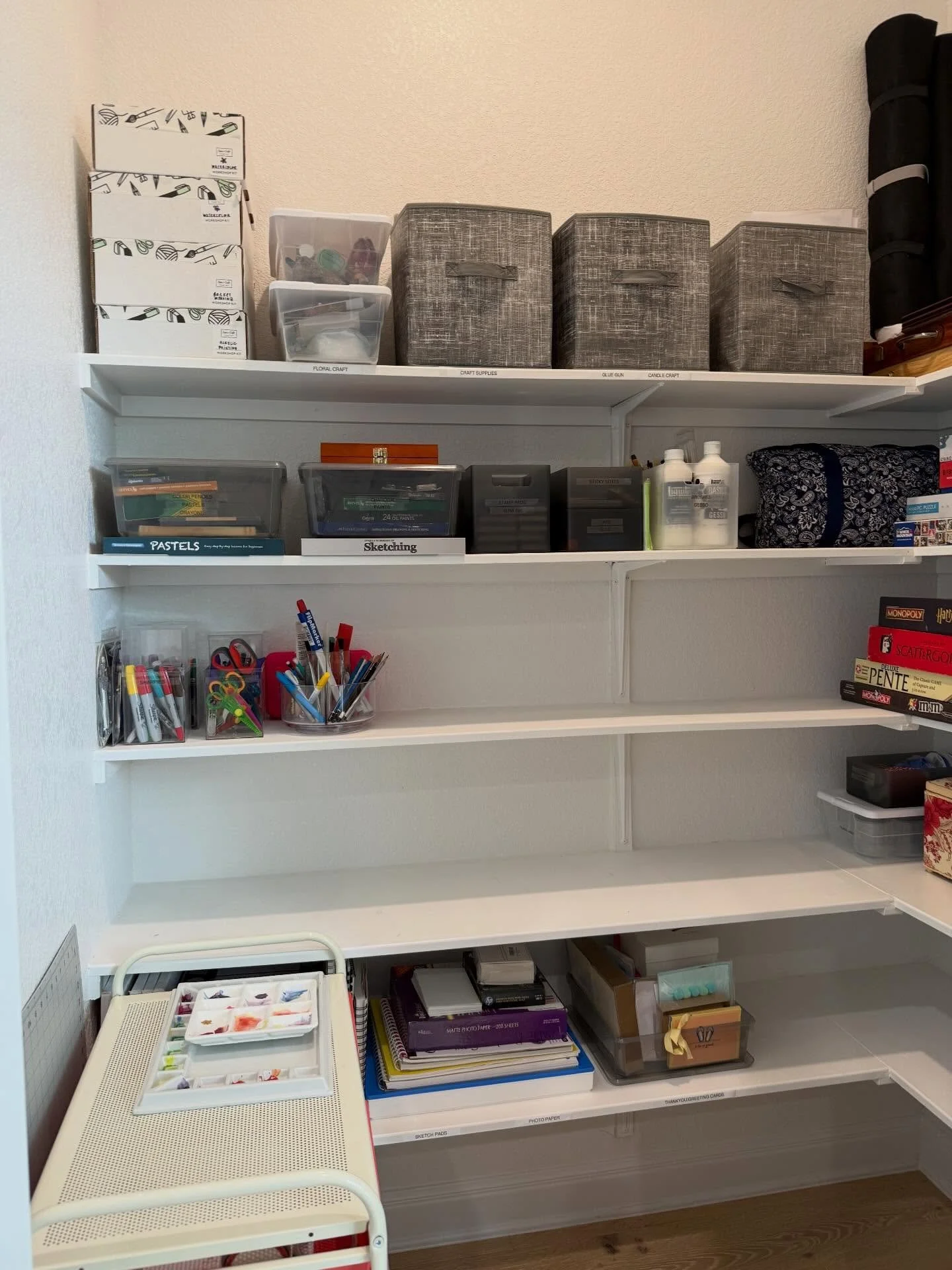 Move-in day, but make it organized ✨⁣ 

AFTER/BEFORE 
⁣
This large office storage closet got a full refresh during move-in! We sorted and categorized craft supplies, games, books, and keepsakes while intentionally leaving blank shelf space for office