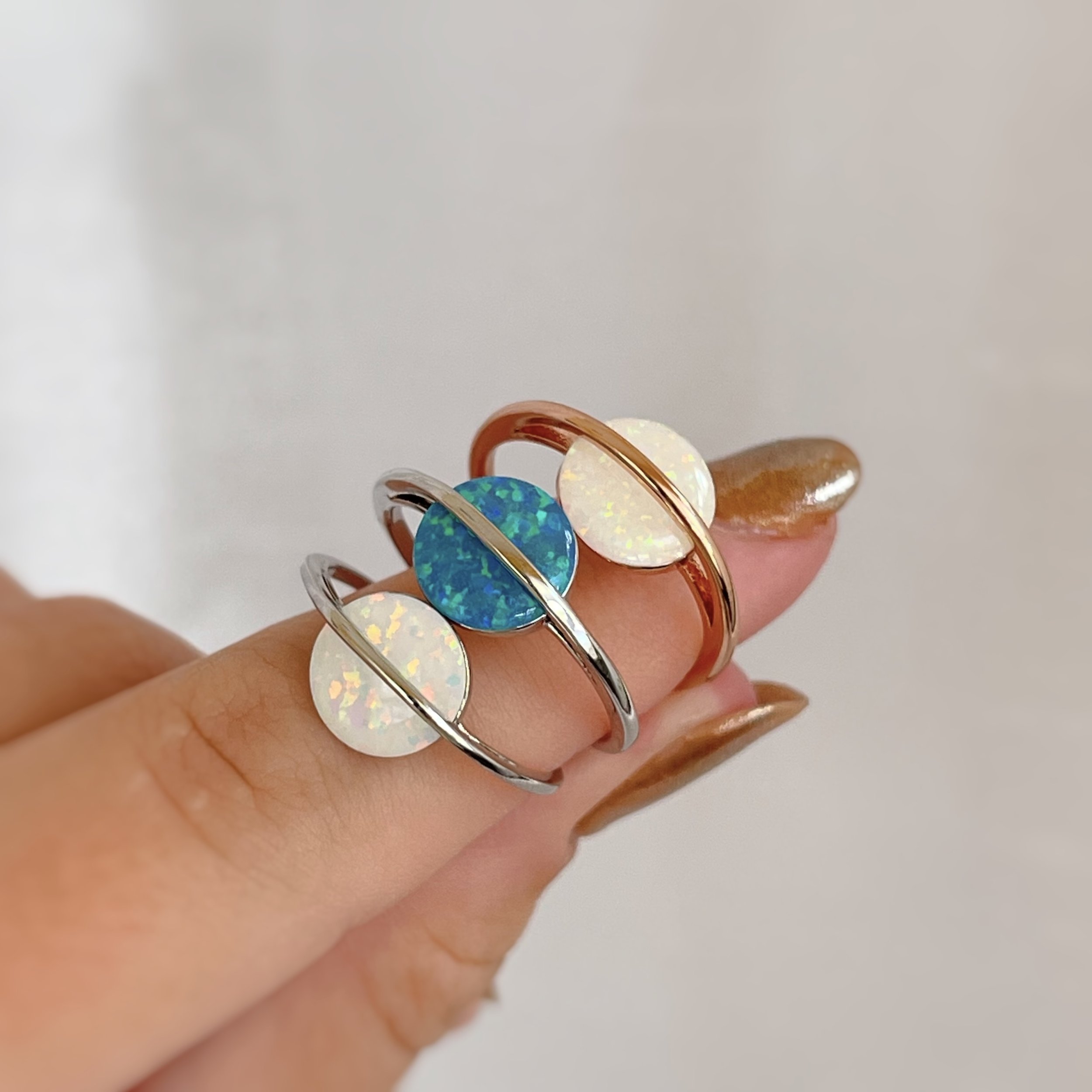 Task : change the blue opal ring to be more vibrant in order to resemble its actual color