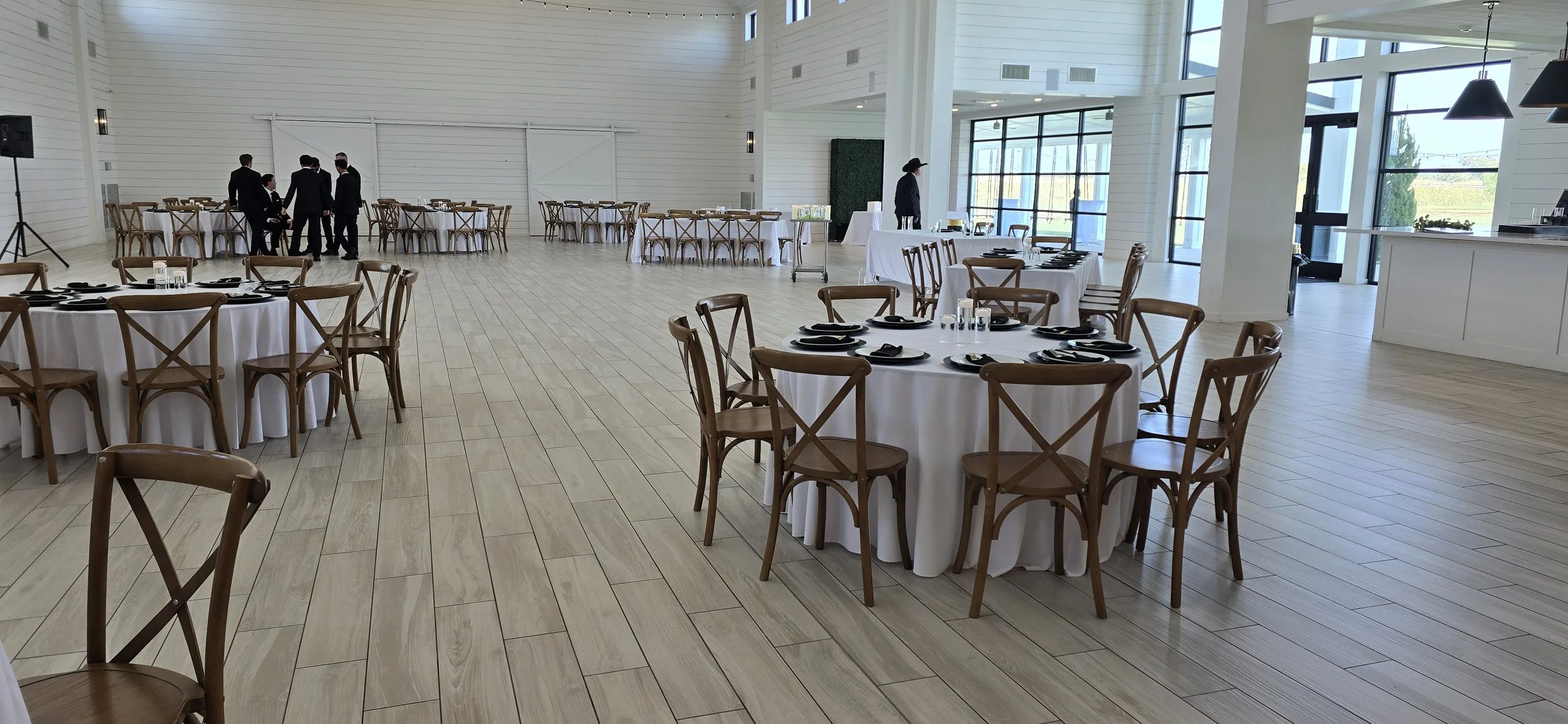 Black and white wedding reception setup by K&D Hospitality Services in North Texas.