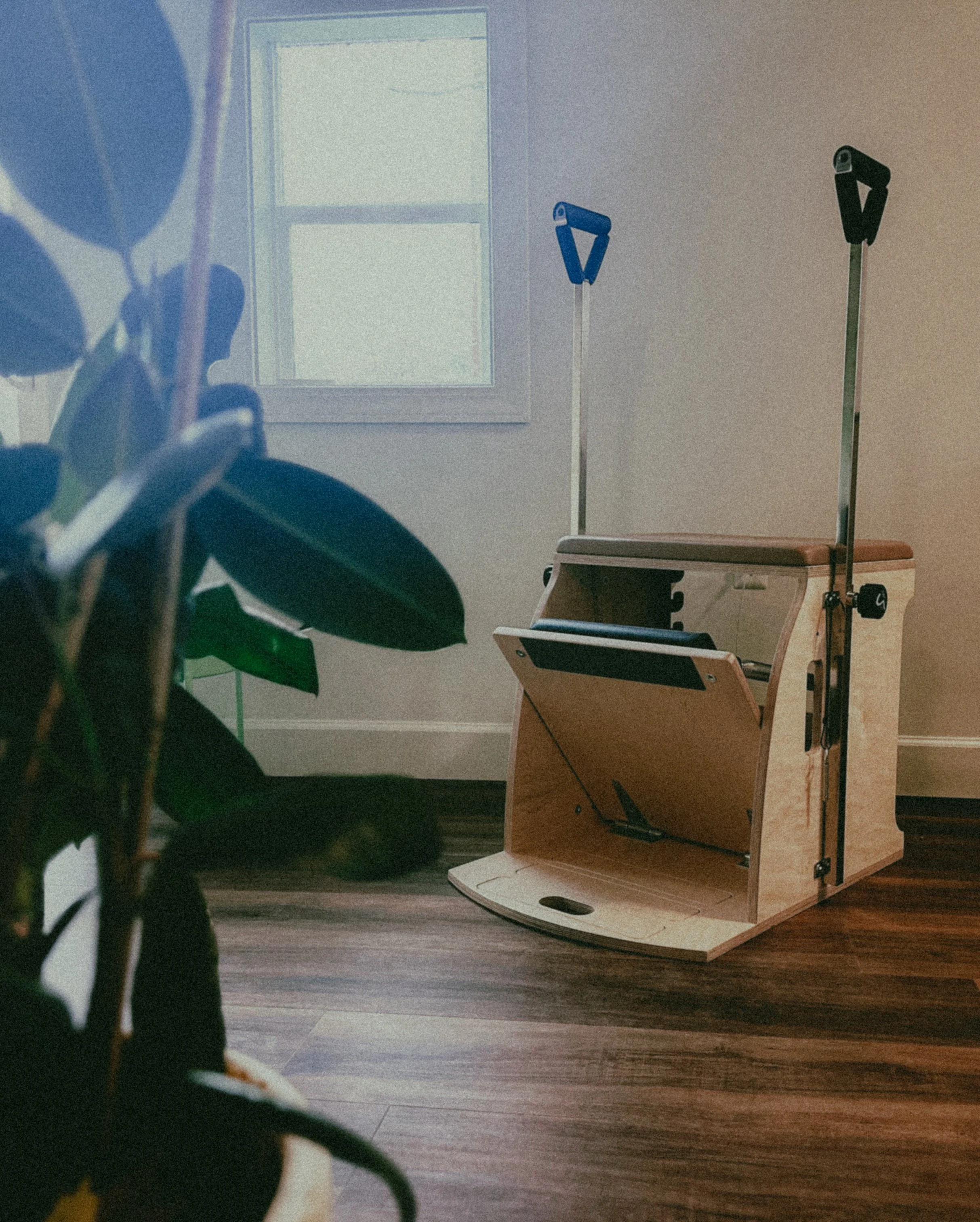 Image of a Wunda Chair with Handles, ready for a private or duet session.