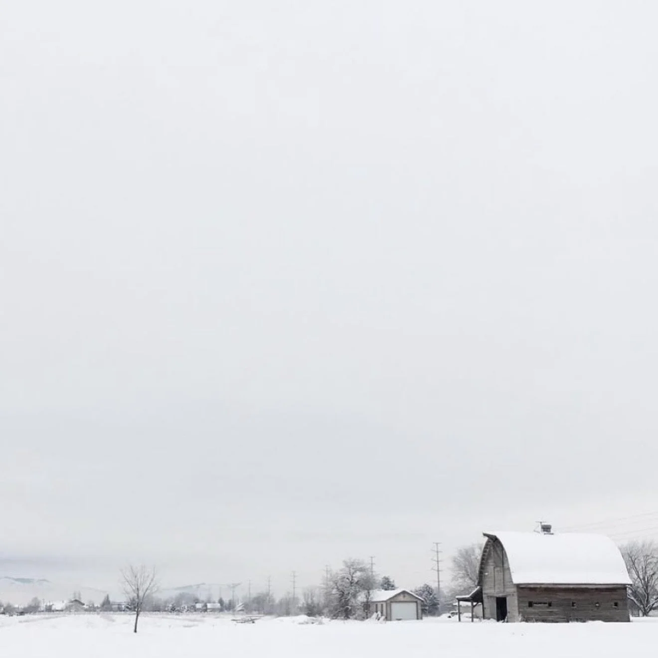 I took this photo ten years ago this week in Meridian. It was an old farmhouse on McMillan near 10 Mile, one of those places that reminded us of the history of our home. It was so quiet that day. I trudged out into the fresh snow to capture just how 