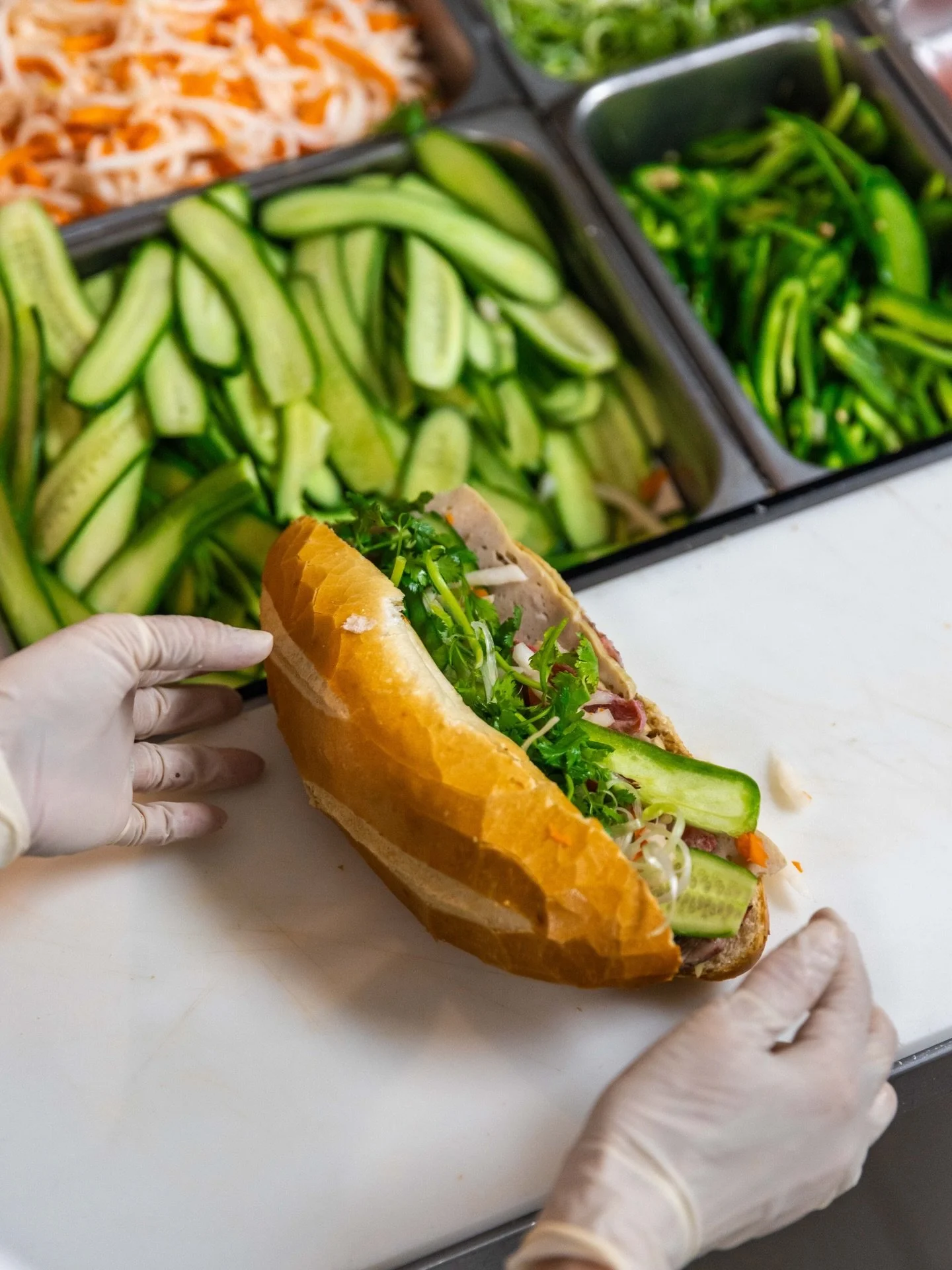 Behind every good b&aacute;nh m&igrave; is crunch, herbs, and pickled veggies doing their job 🥖😋

#ocfood #bakery #pastries #vietnamesedessert #vietnamese