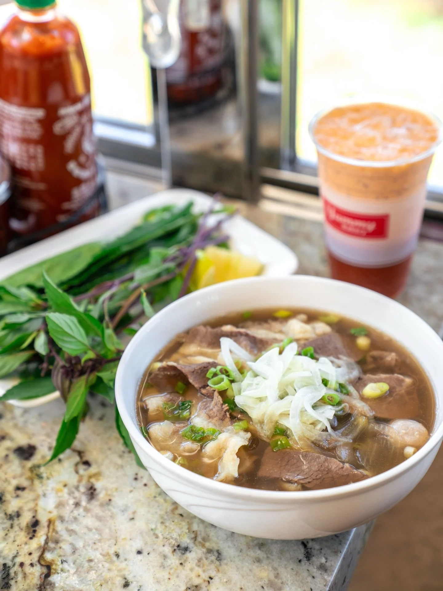 Everything on this table is working overtime 🍜🧋 Pull up and build your perfect bowl.

#ocfood #pho #vietnamesefood #vietnamese #noodles