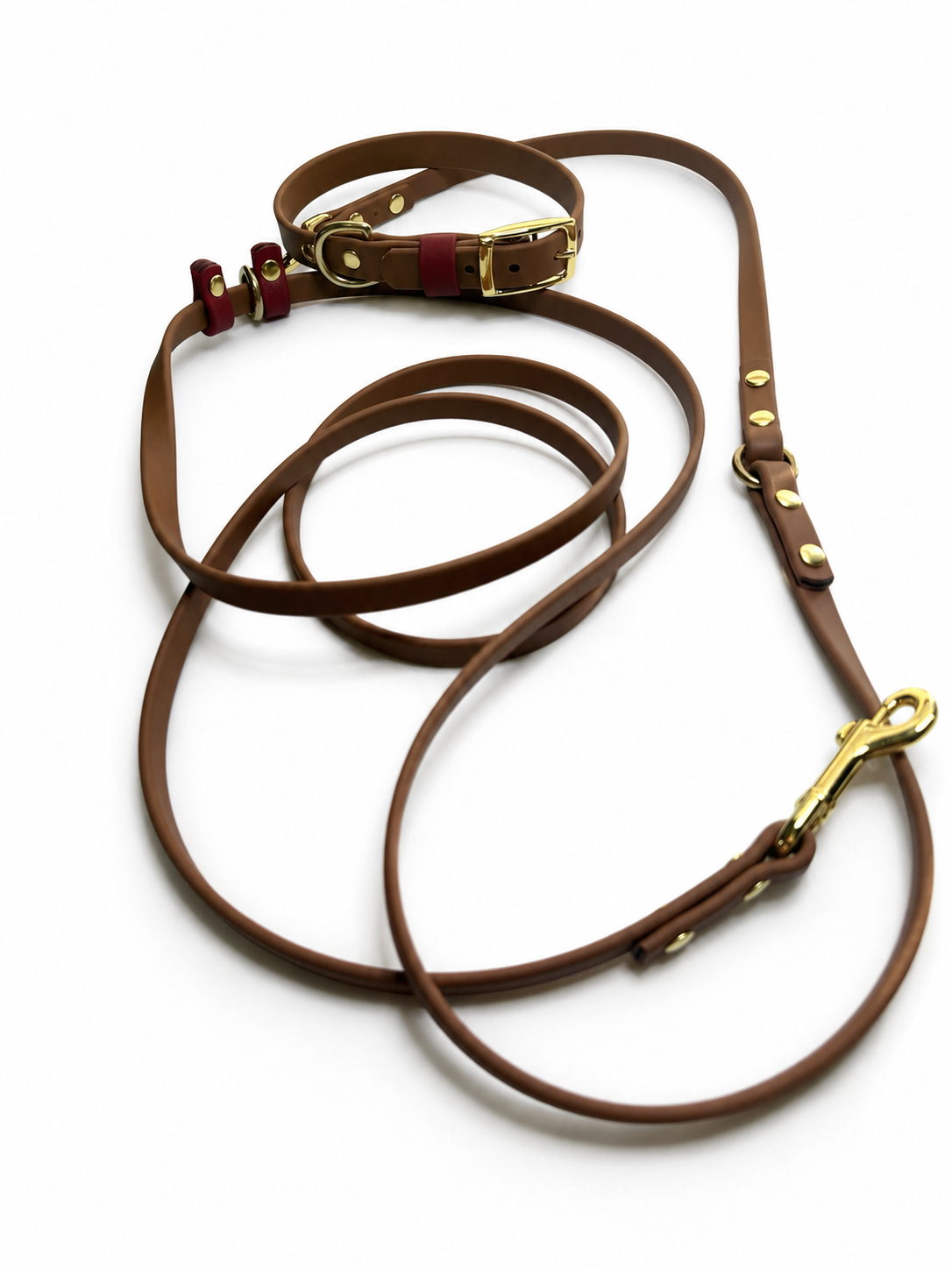 The GO HandsFree Leash in Honey Brown primary Chili Red keeper  Solid Brass Hardware