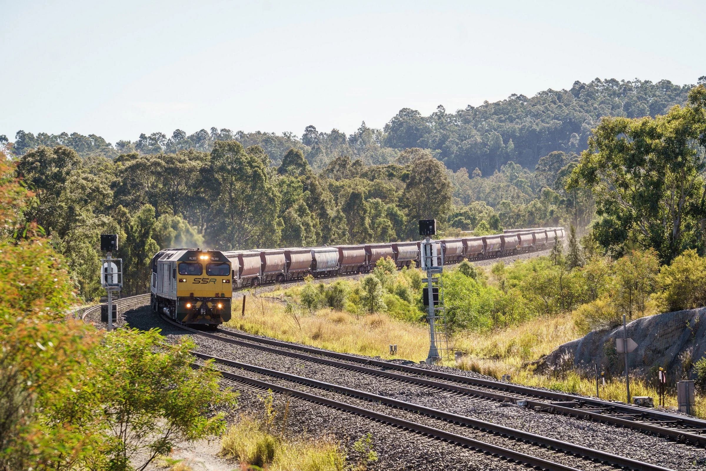 Freight train photographed moving through an ARTC rail corridor in the Newcastle region.