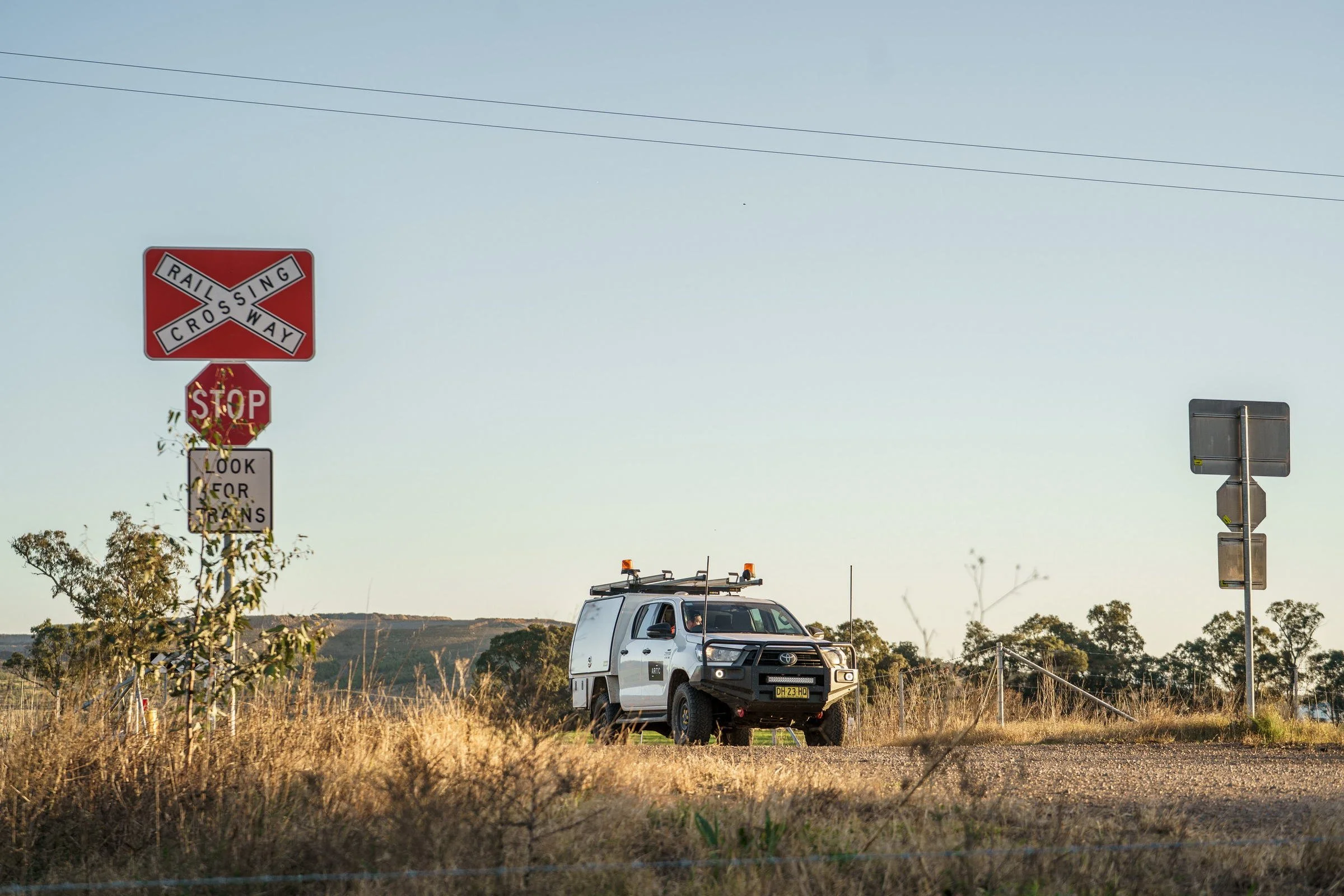 ARTC rail corridor signage and site vehicle photographed during rail infrastructure operations in NSW.