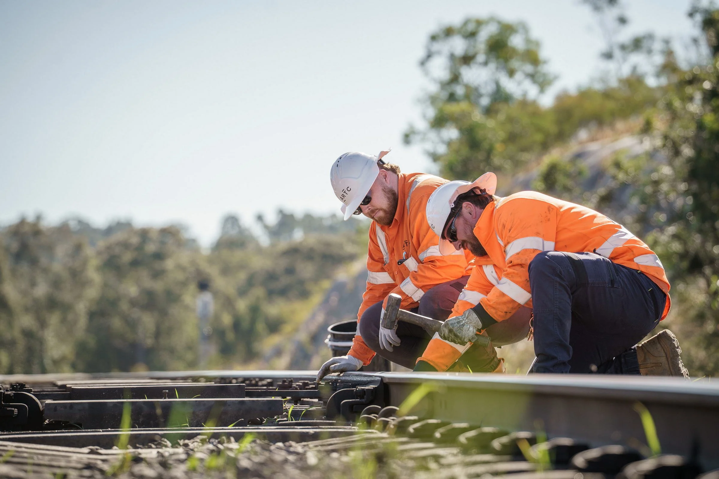 ARTC rail maintenance crew photographed working on track during a rail infrastructure shoot.