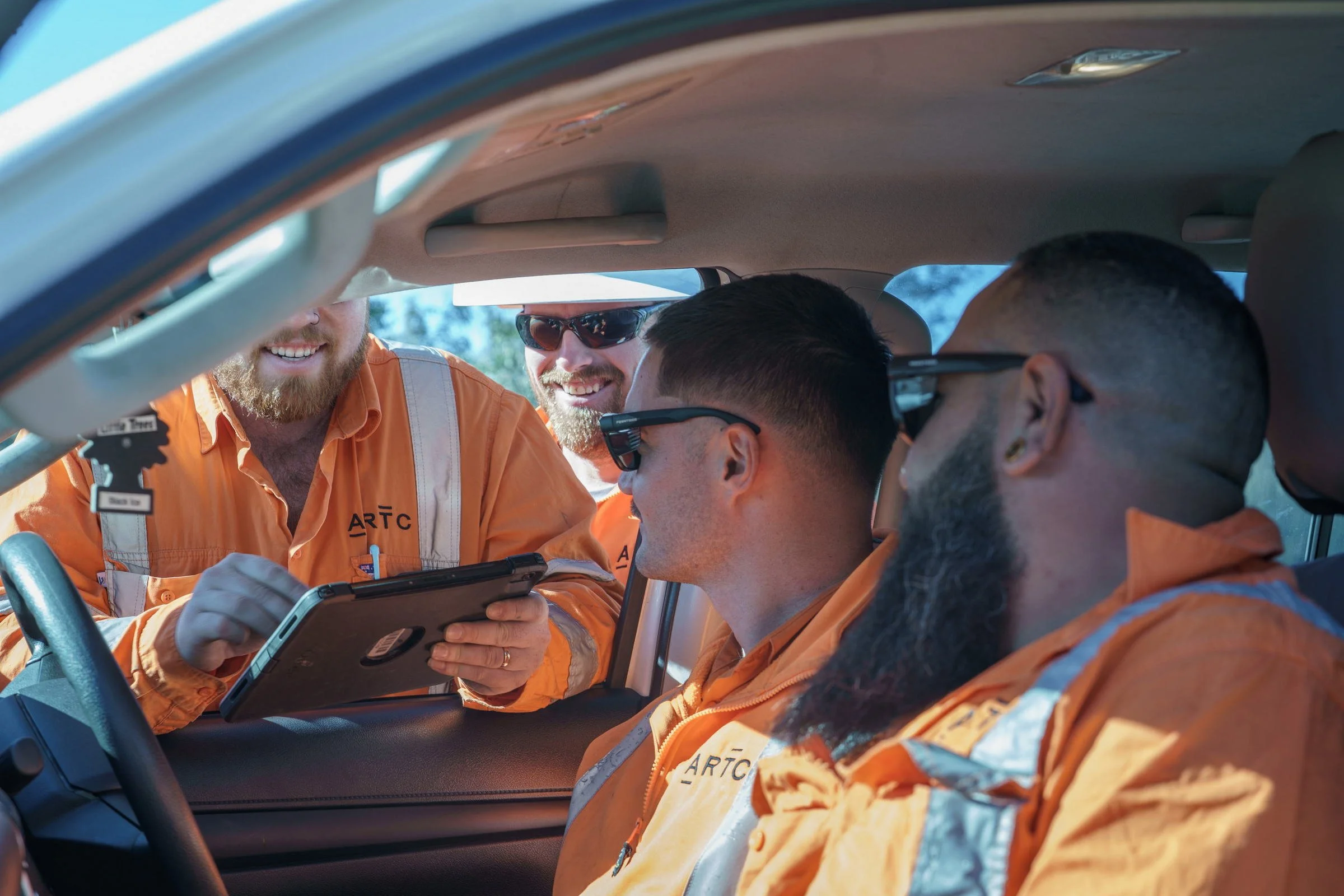 ARTC rail personnel photographed inside a maintenance vehicle during rail operations in Newcastle.