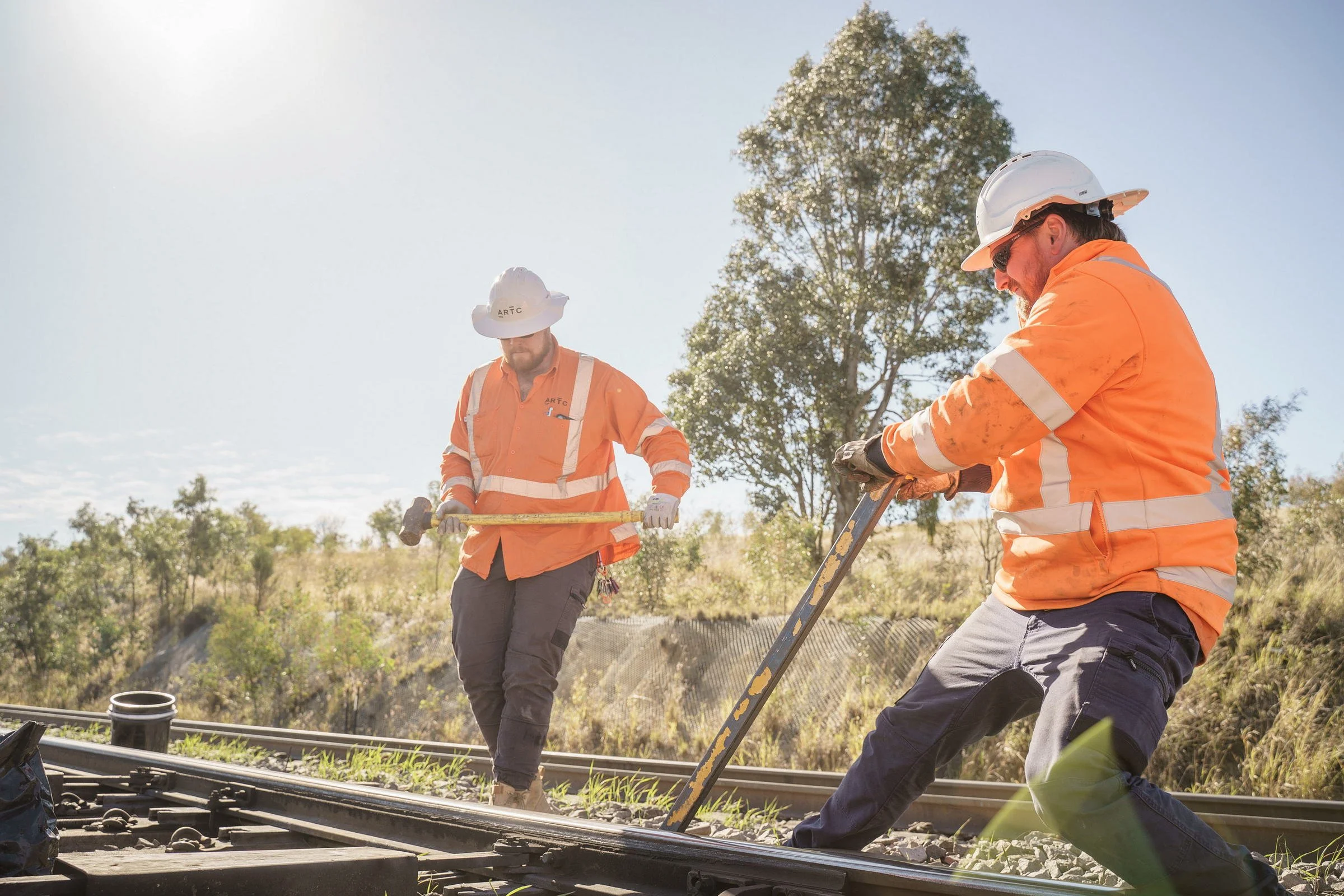 ARTC rail workers photographed on an infrastructure site during rail operations in Newcastle.