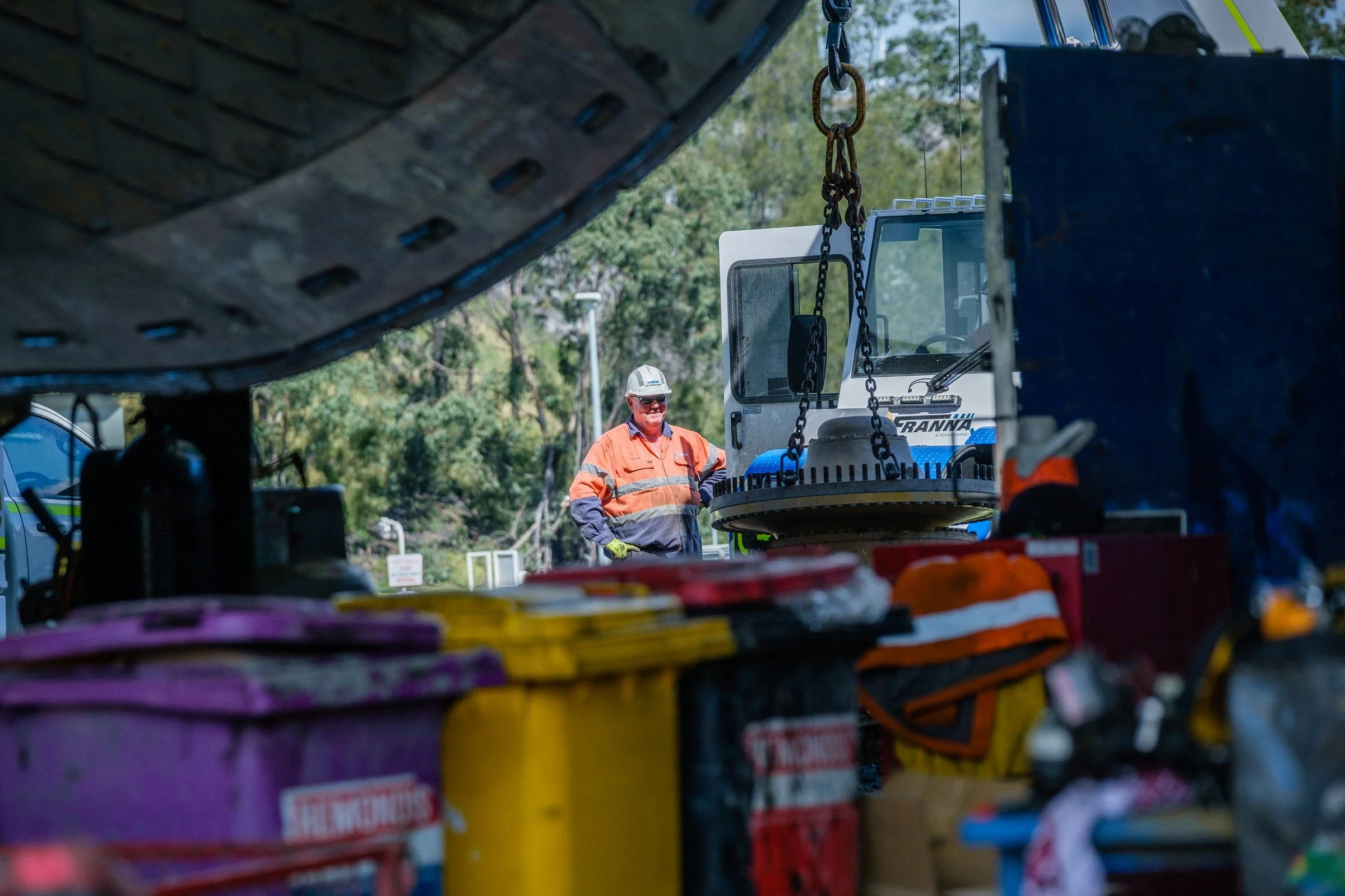Mine worker photographed near processing plant equipment during a NSW Resources Regulator image library shoot.
