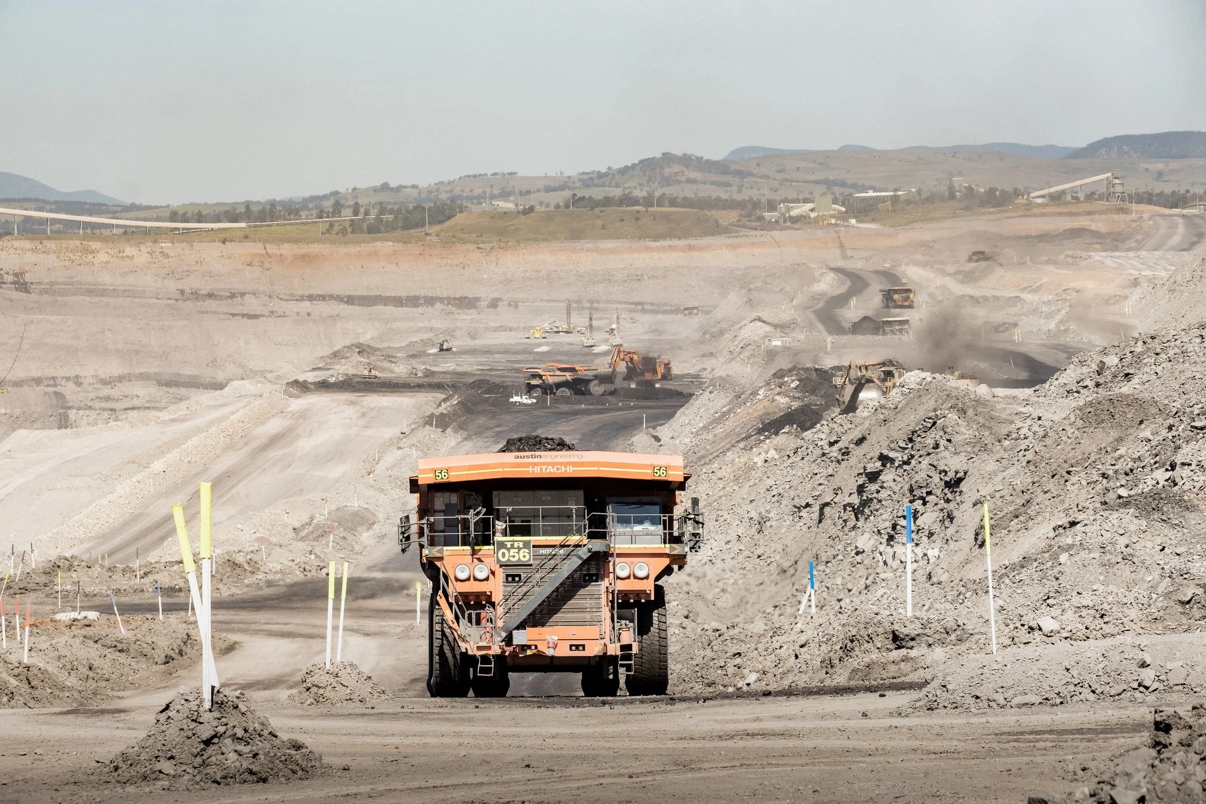 Haul truck travelling along an open-cut mine haul road in NSW.