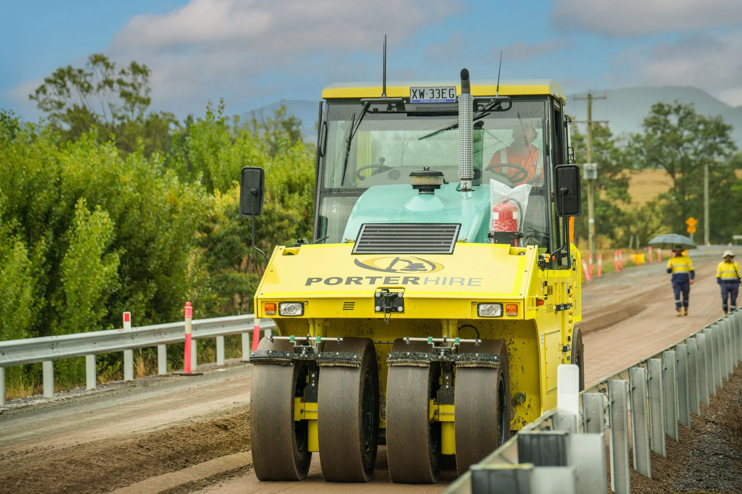 Porter Hire Ammann roller working during active road construction near Singleton NSW