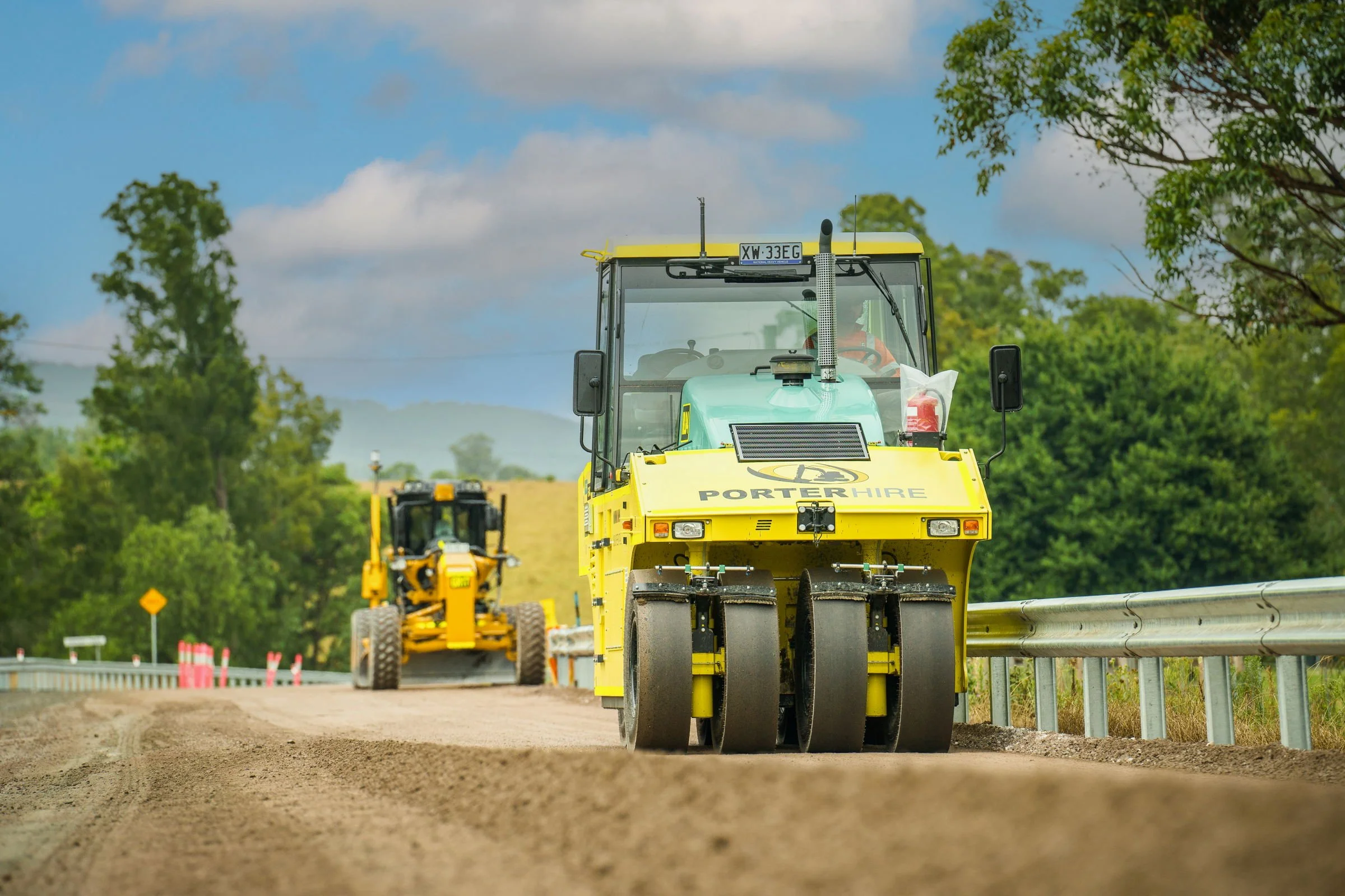 Road construction equipment operating on an active civil works site near Singleton NSW