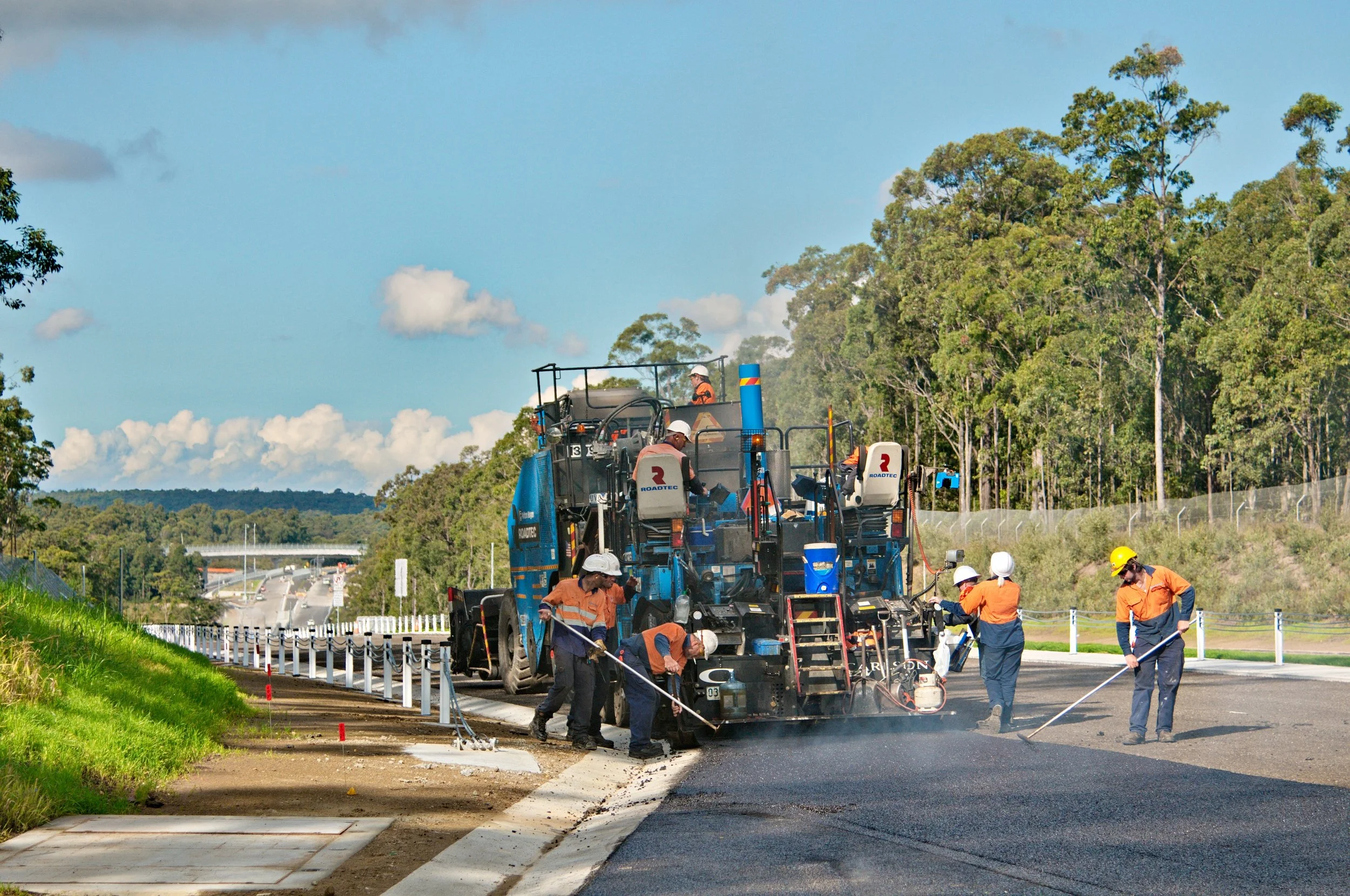 Road paving crew working on a major road construction project in the Hunter region NSW
