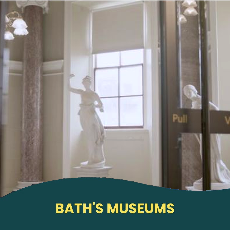 Interior entrance to Victoria Art Gallery with classical sculptures, labelled Bath’s Museums.