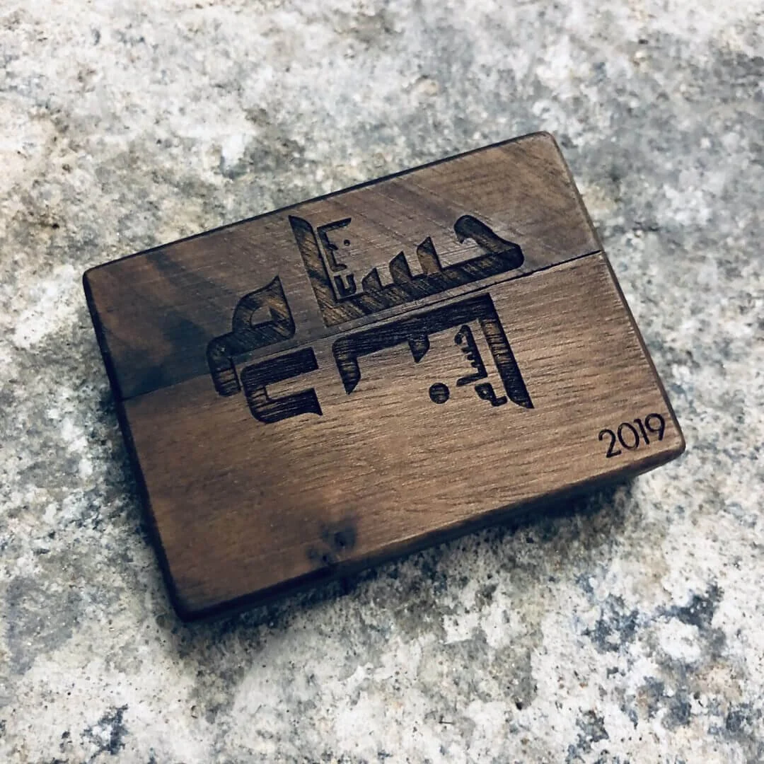 Wooden jewellery box engraved in Arabic.