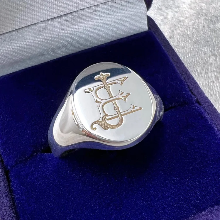 Sterling silver signet ring engraved with a personalised monogram in our Hatton Garden workshop