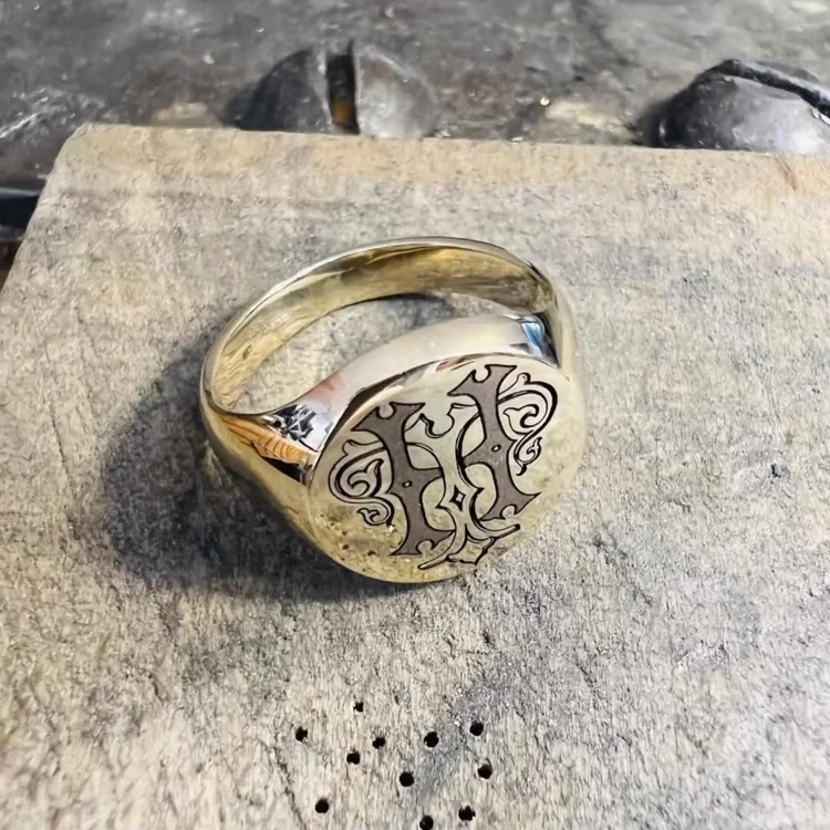 Solid gold over signet ring engraved with a personalised monogram in our Hatton Garden workshop