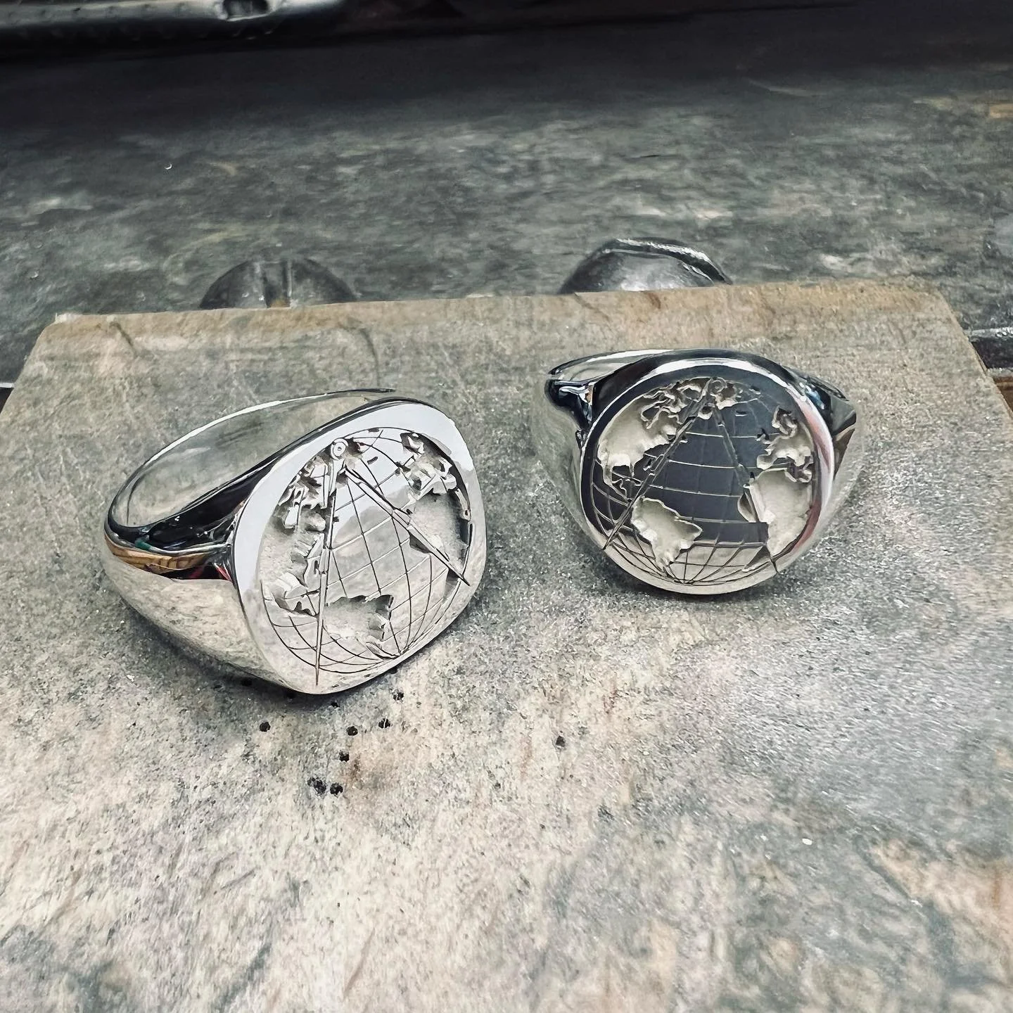 Maps engraved into a ring