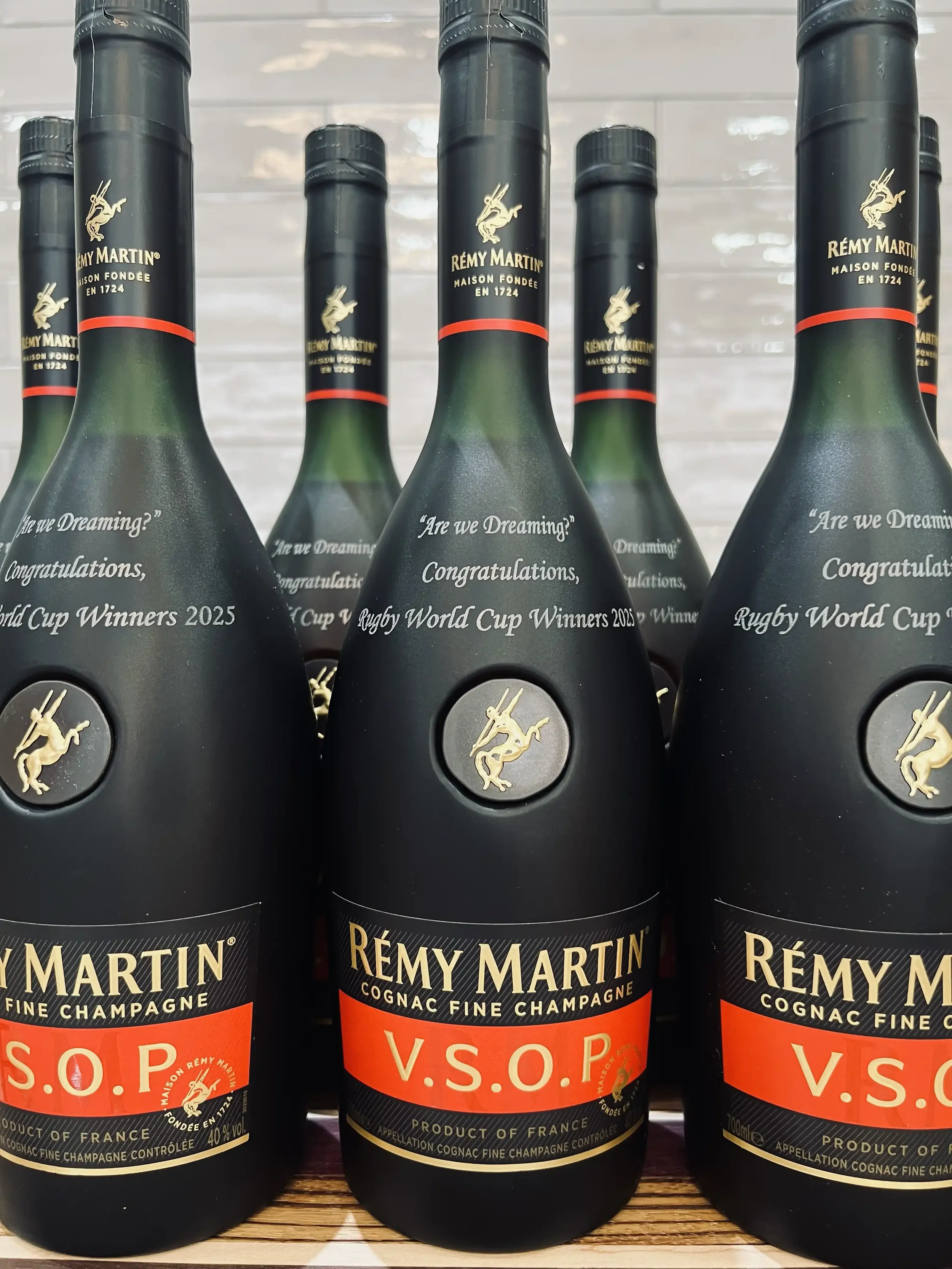 Rémy Martin custom-engraved Cognac bottles commisioned for the 2025 Rugby World Cup winners.