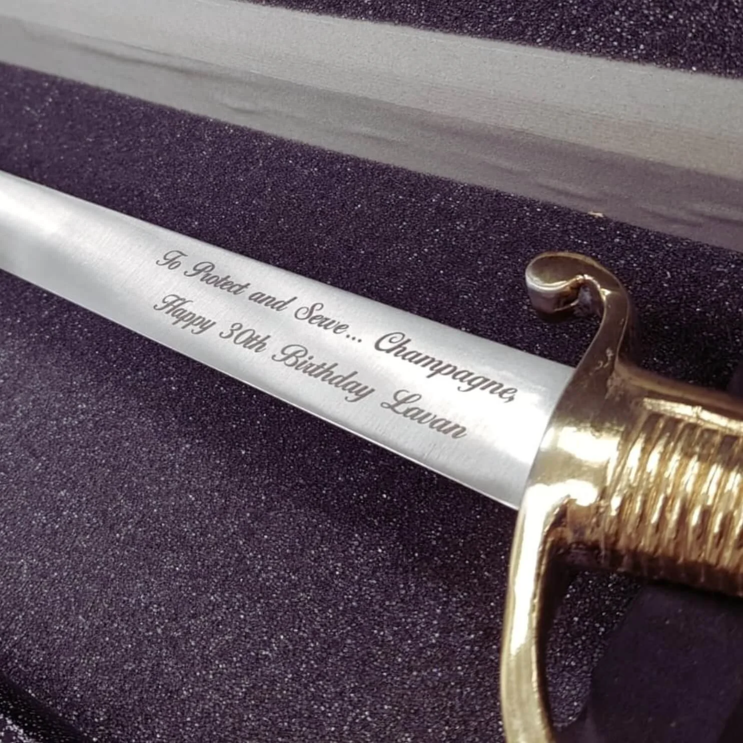 A sword with an engraved message.