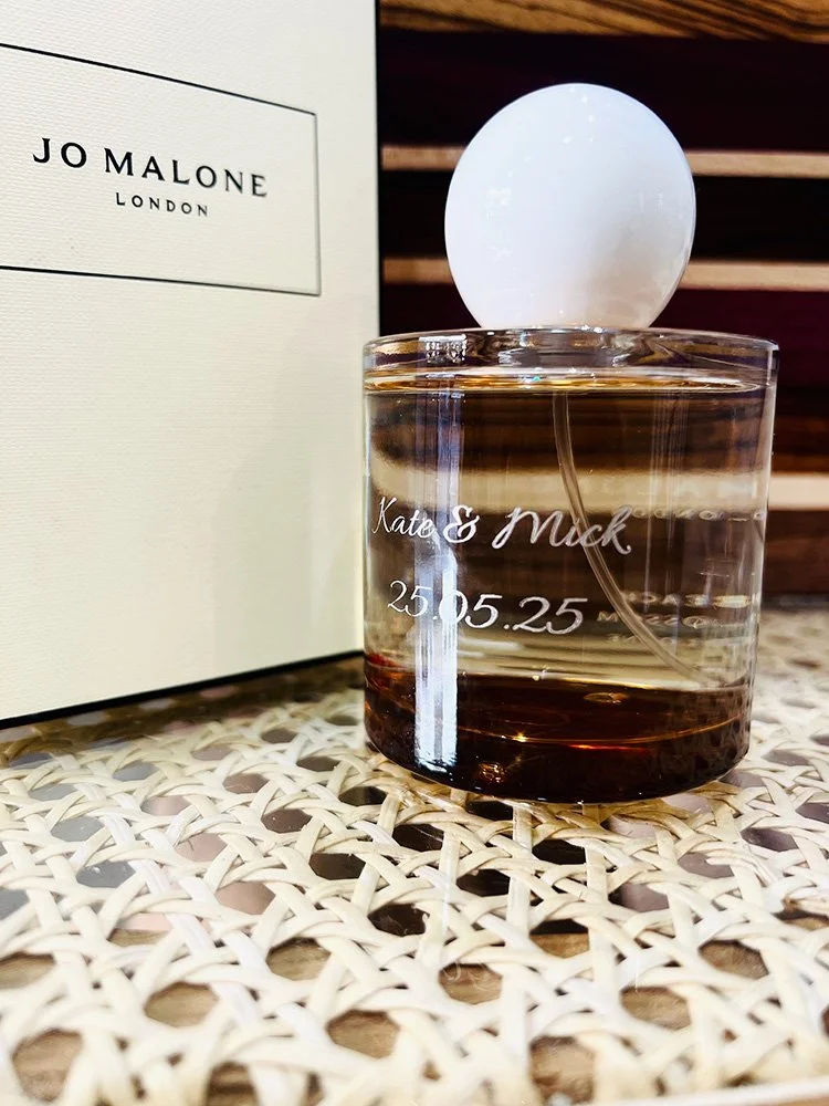 Personalised Jo Malone perfume bottle laser engraved and hand infilled with silver wax to make the engraving 'pop'.
