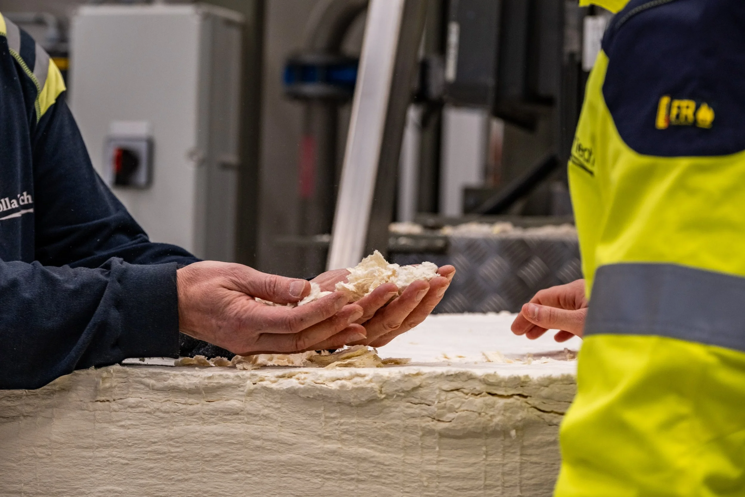 Two workers inspecting the process.