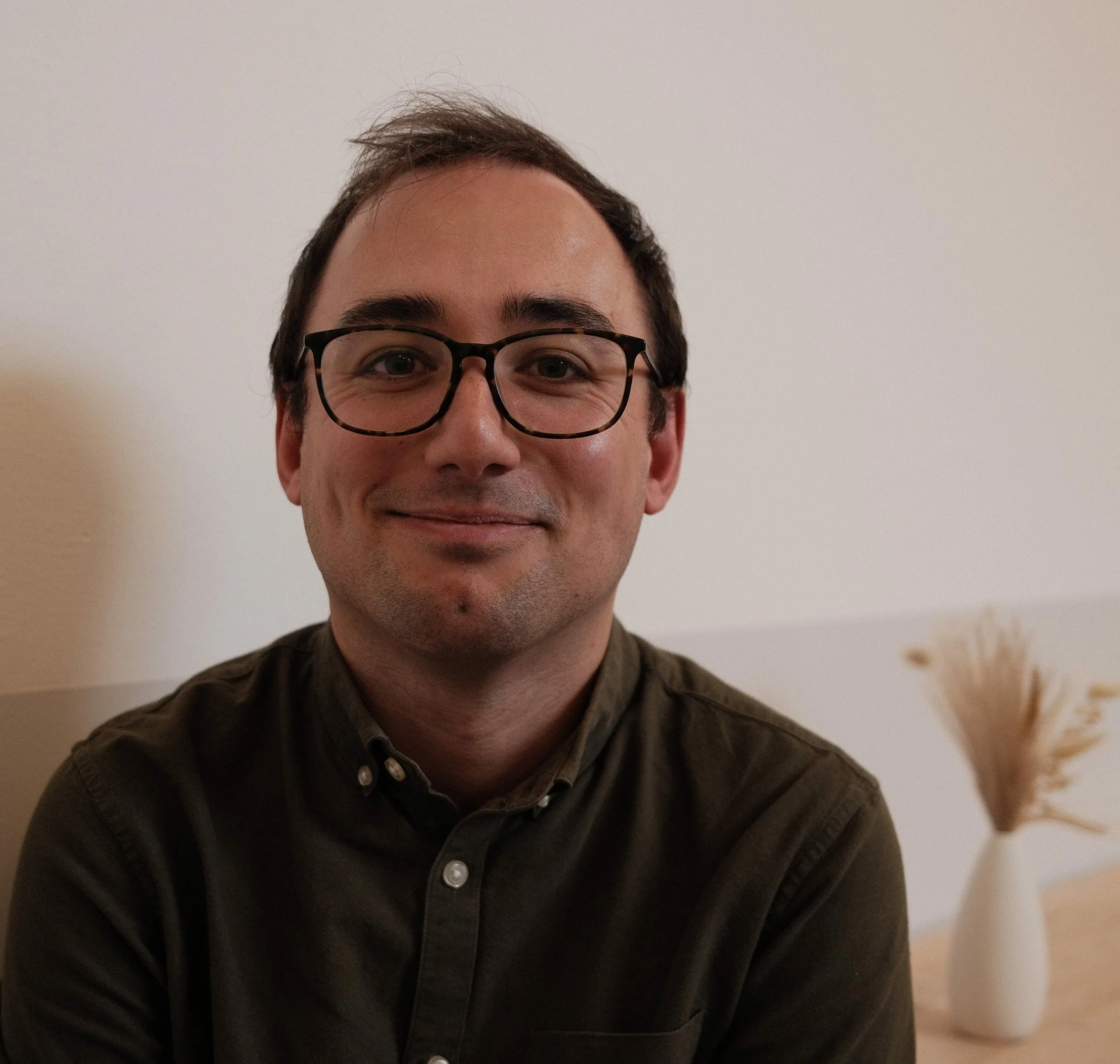 Headshot of Adam Yip