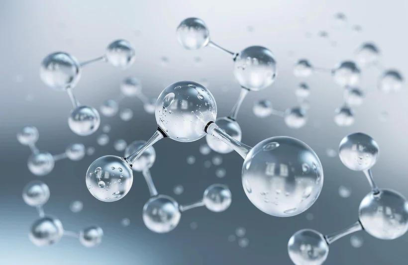 Close-up of a molecular structure with interconnected spheres and bonds, representing a scientific model of molecules.