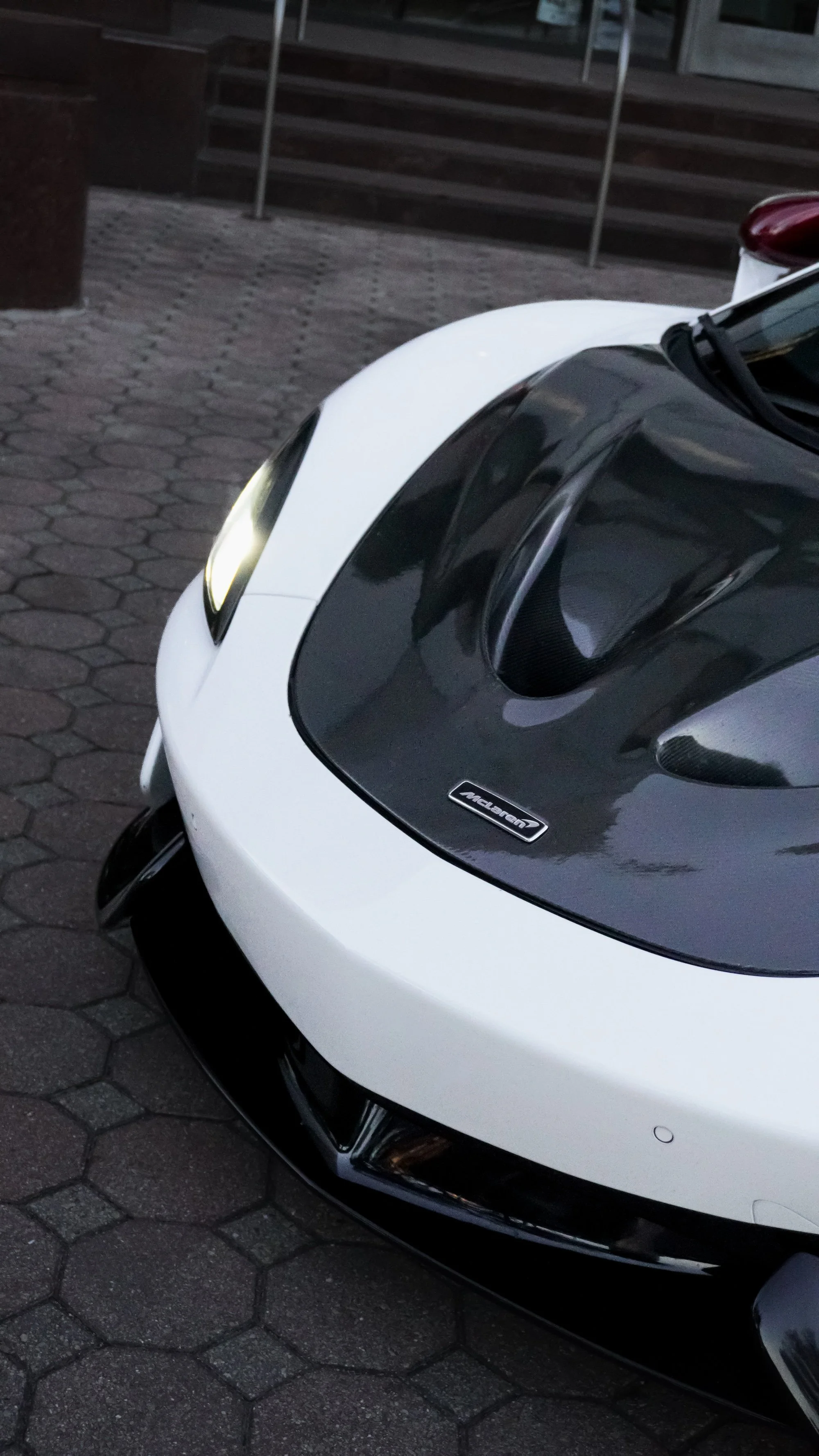 Carbon fiber hood detail on McLaren 570S Spyder exotic rental Tampa