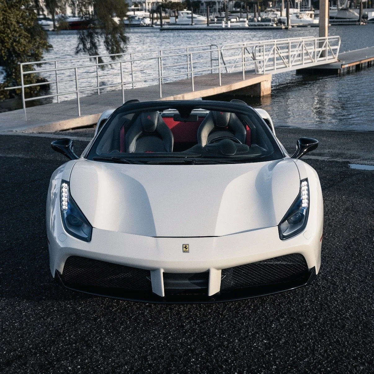 Front view of Ferrari 488 Spyder convertible exotic rental Tampa