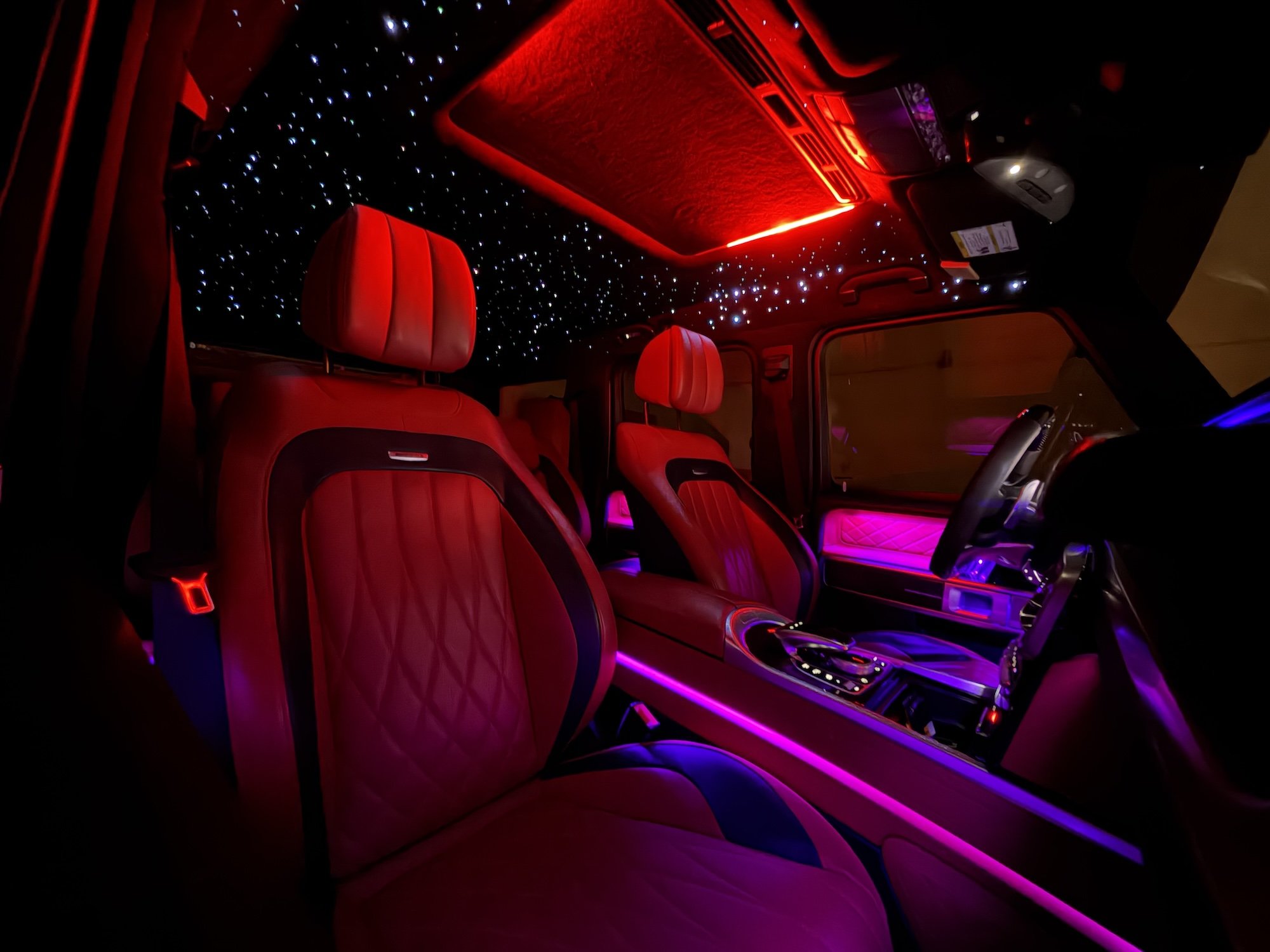 Mercedes-AMG G63 rental with red leather interior and custom starlight headliner in Tampa