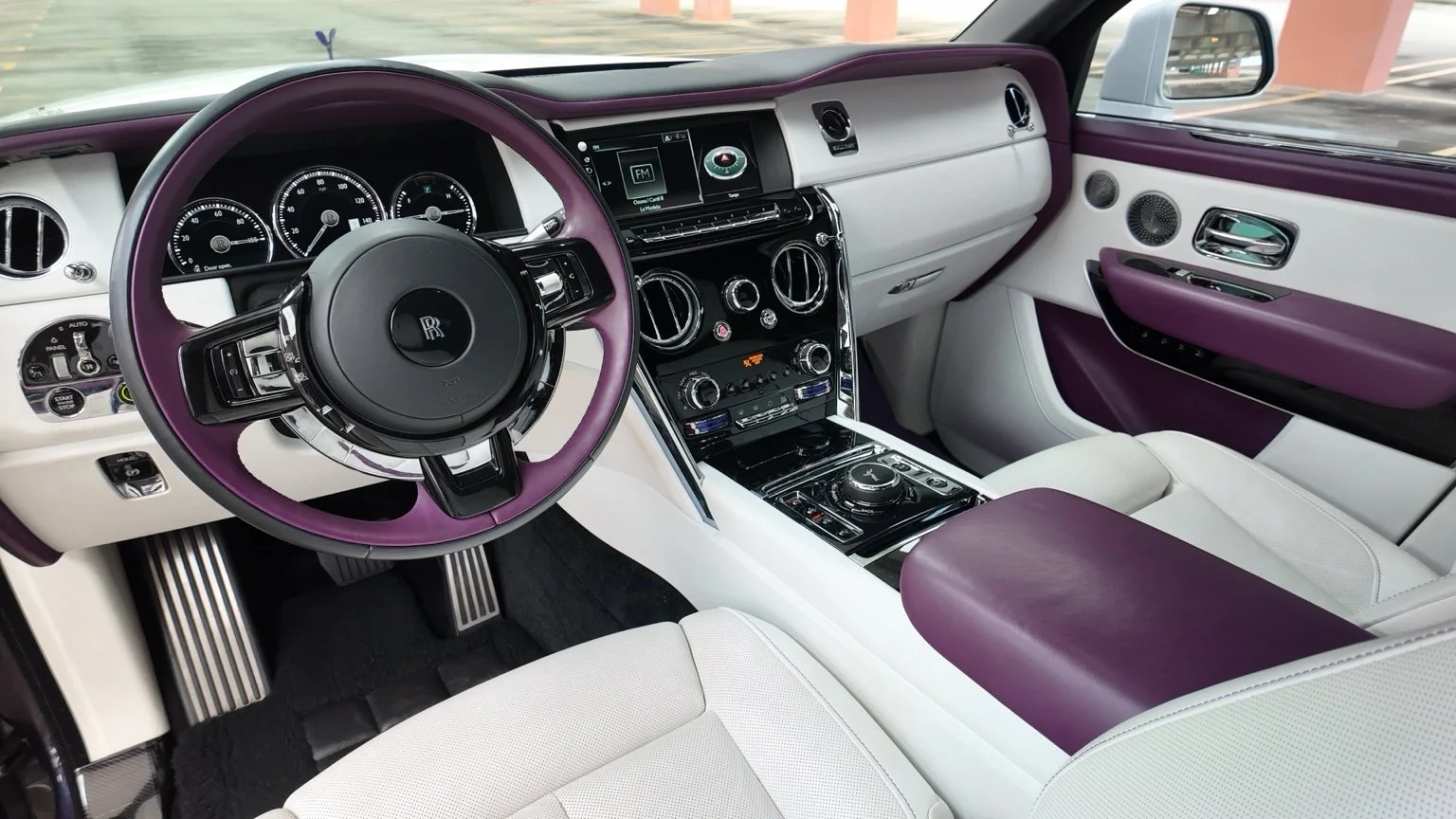 White and purple Rolls Royce Cullinan interior with luxury leather seats and premium dashboard