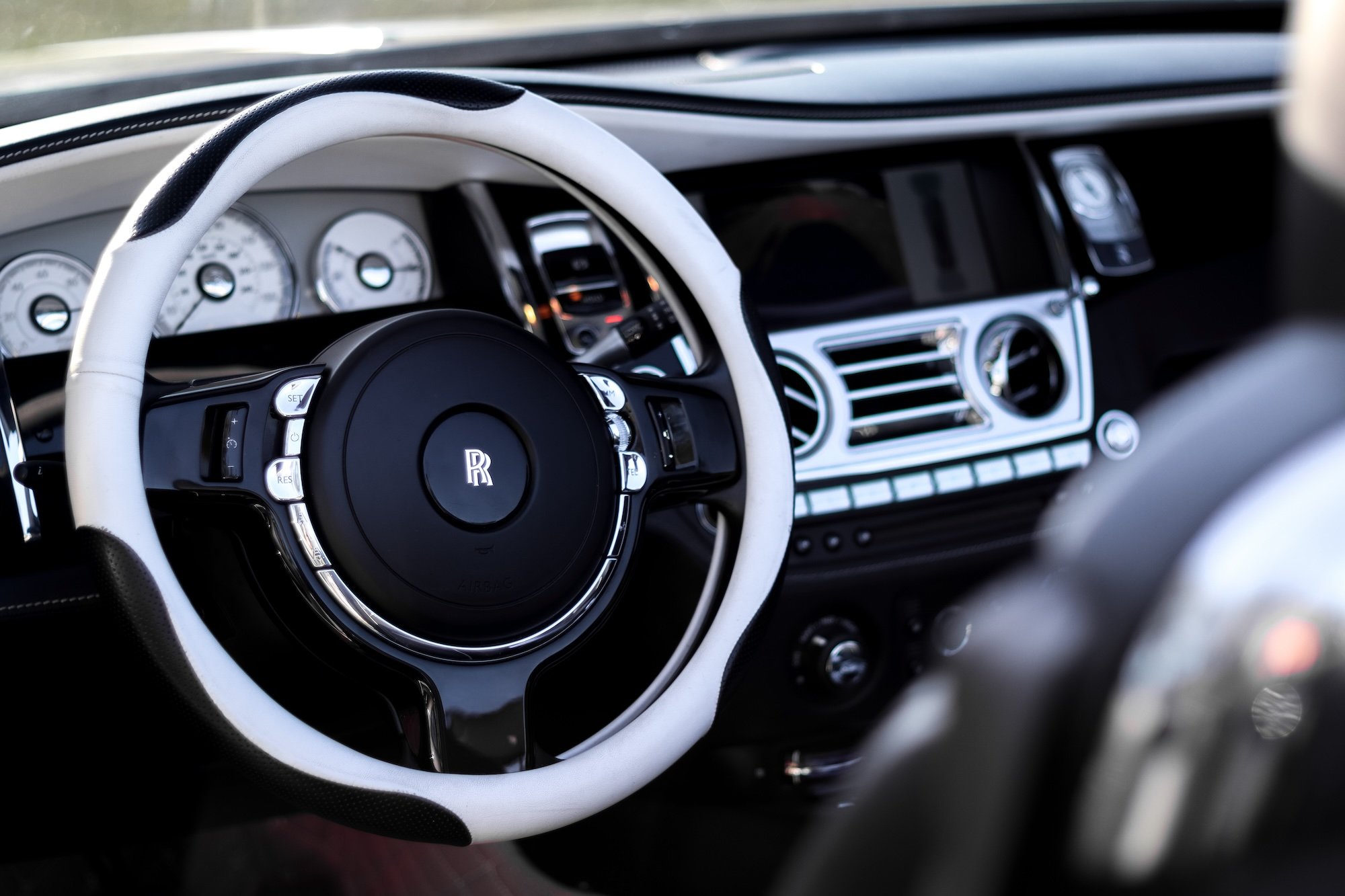 Rolls-Royce Dawn interior steering wheel and dashboard luxury detail
